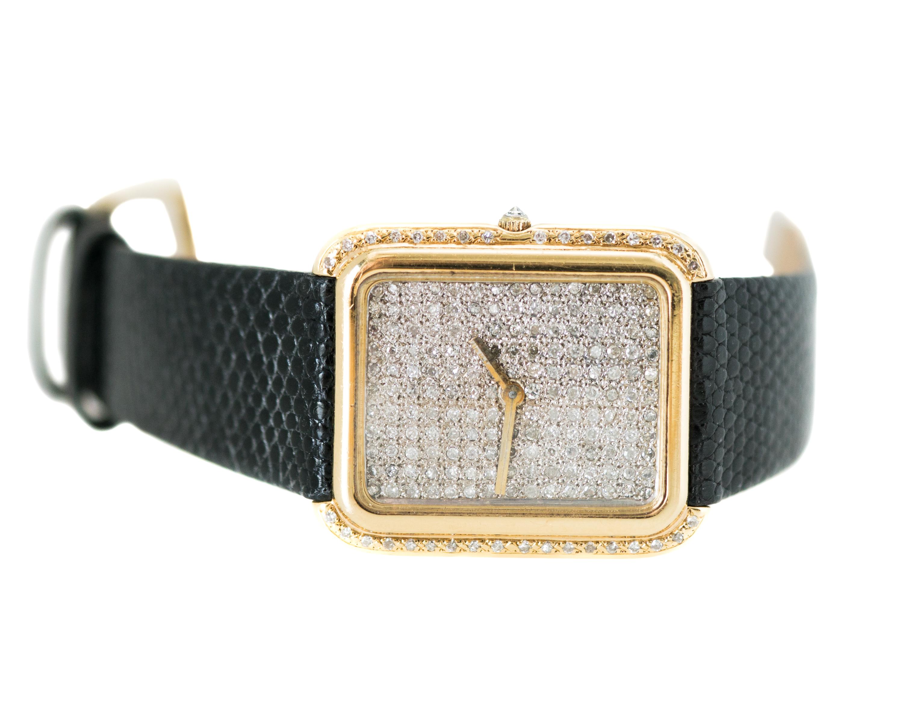 1970s Corum Diamond Watch - 18 Karat Yellow Gold, Diamonds

Features:
Custom Added 2.0 carat total Diamonds
18 Karat Yellow Gold Case 
Custom Genuine Lizard Strap
Case measures 35 x 30 millimeters without crown
Diamond Face
Gold Hour and Minute