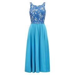 Abito e giacca in jersey di seta Couture anni
70 con corpetto di paillettes