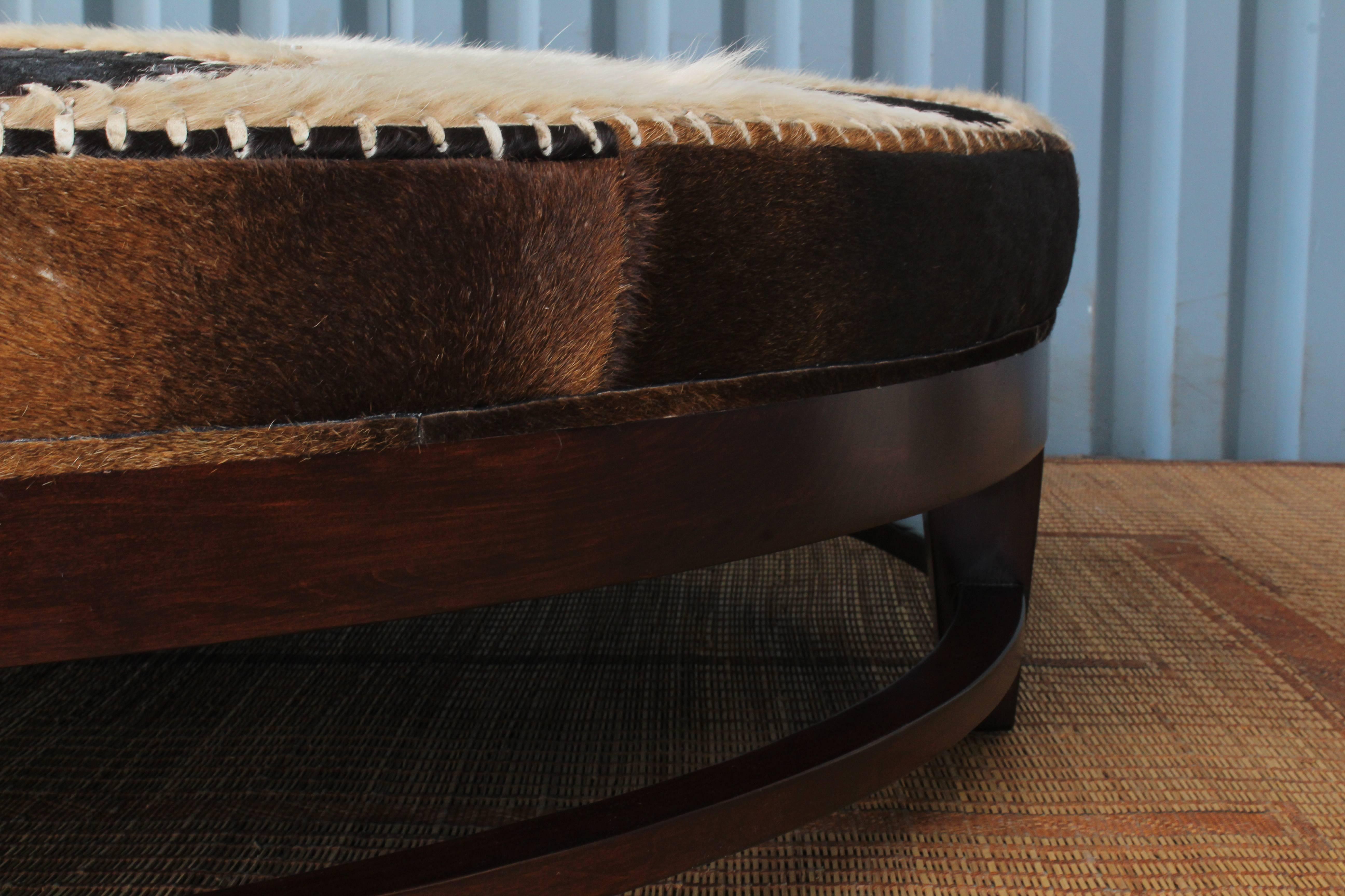 Late 20th Century 1970s Cowhide Ottoman with Walnut Base