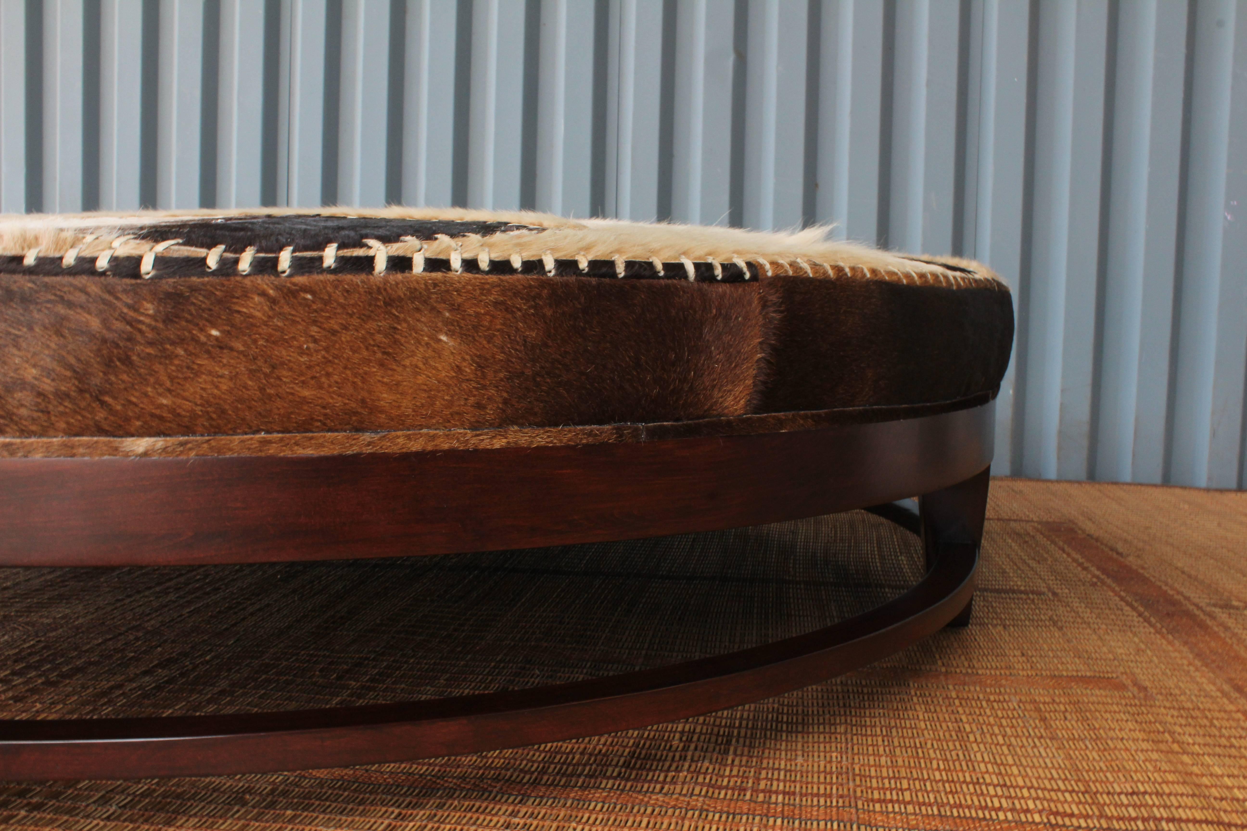 1970s Cowhide Ottoman with Walnut Base 1