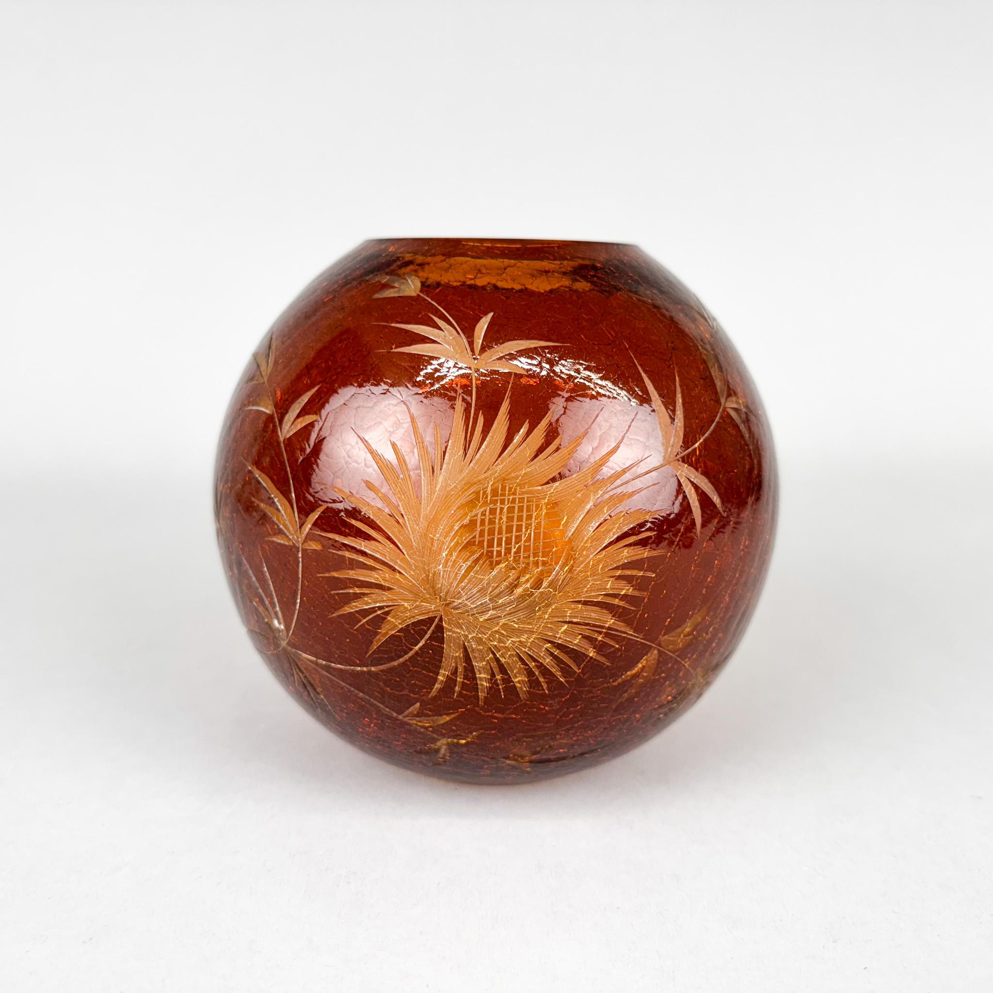 Vintage vase made of crackled glass with hand cut flower pattern. 
Made in the former Czechoslovakia in the 1970s.
