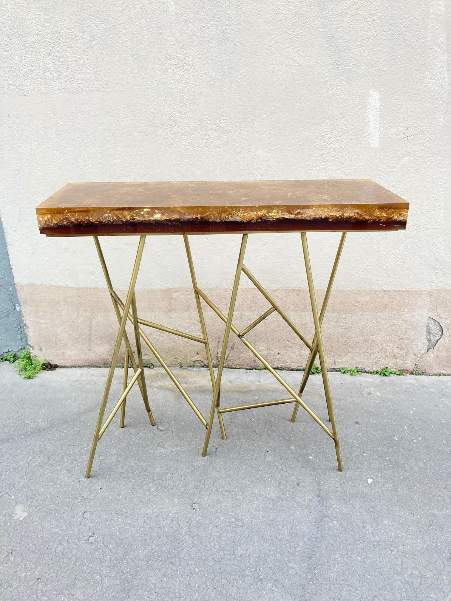 One of a kind brass console with crushed ice resin top
designed during the late 70's by Marie-Claude de Fouquières
Provenance : private collection Paris
Good vintage condition , one or two very small crack to the resin, vintage patina to the