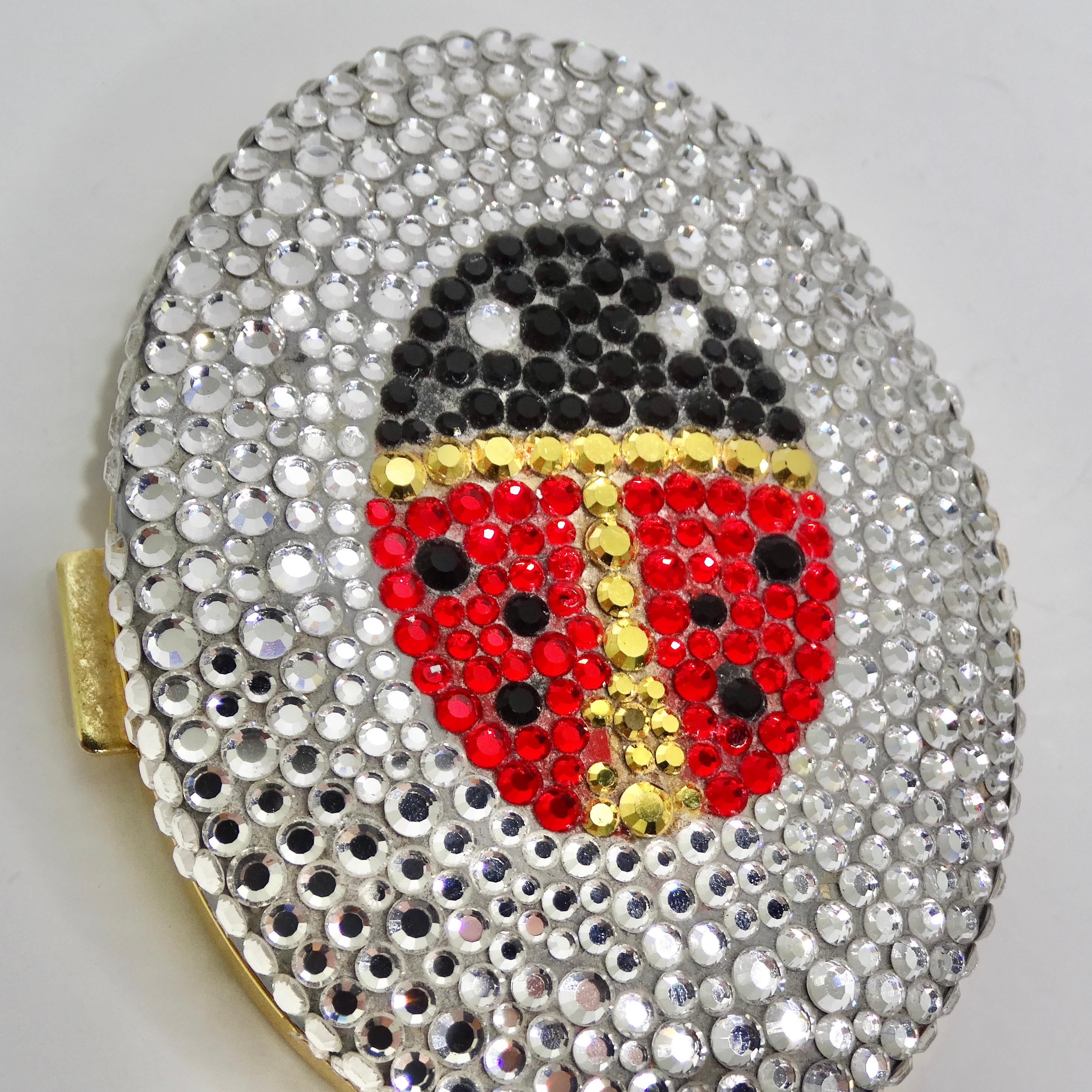 Introducing the 1970s Crystal Ladybug Compact Mirror – a charming and practical accessory that adds a touch of vintage elegance to your daily routine. This delightful compact mirror is designed for those who appreciate both style and functionality.
