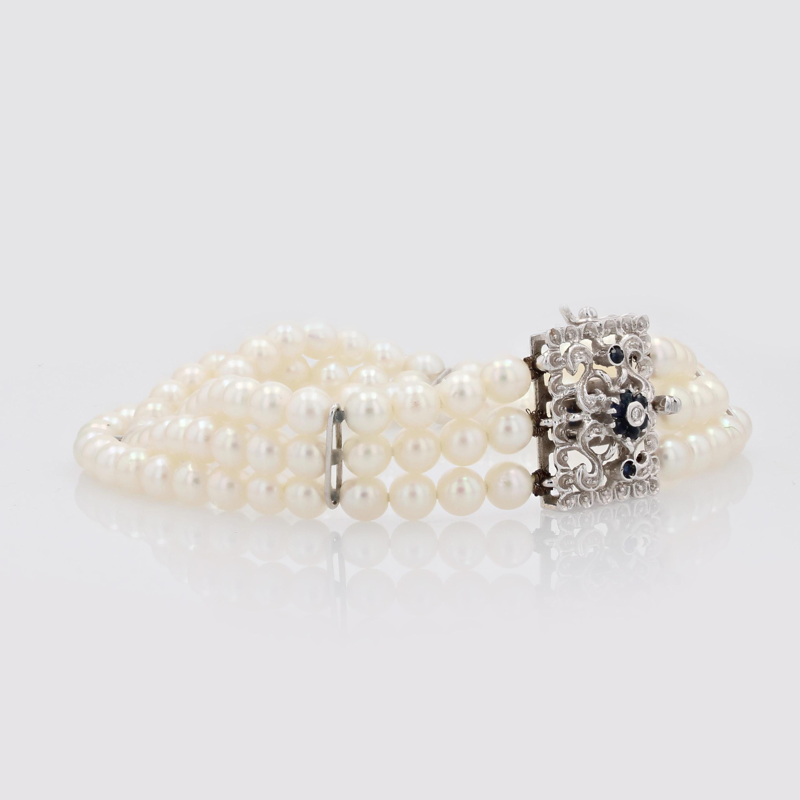 Donna Bracciale anni '70 con perle coltivate, oro bianco 18 carati, zaffiro e diamante, chiusura a 3 file in vendita