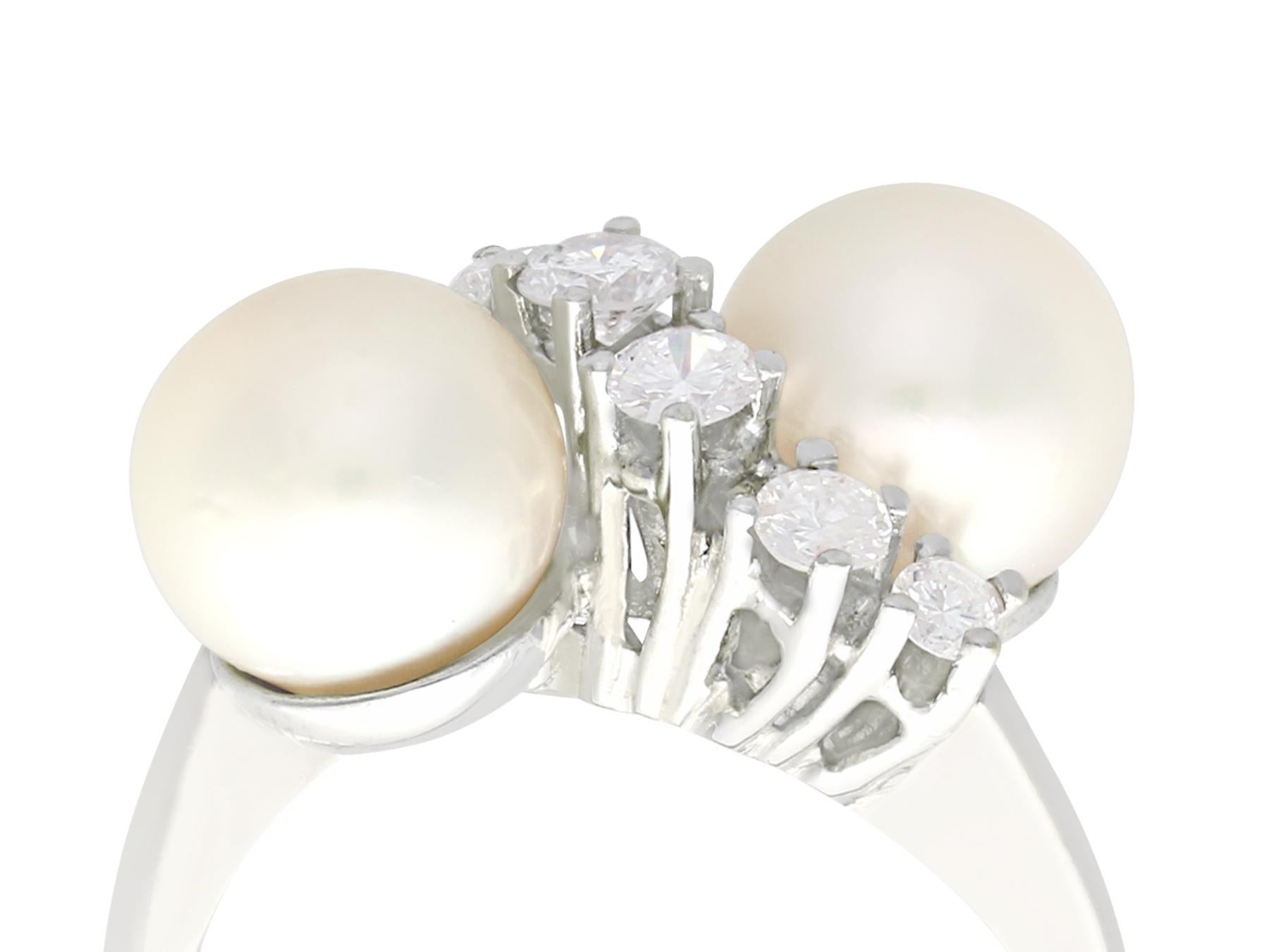 Round Cut 1970s Cultured Pearl and 1.04 Carat Diamond White Gold Twist Ring For Sale