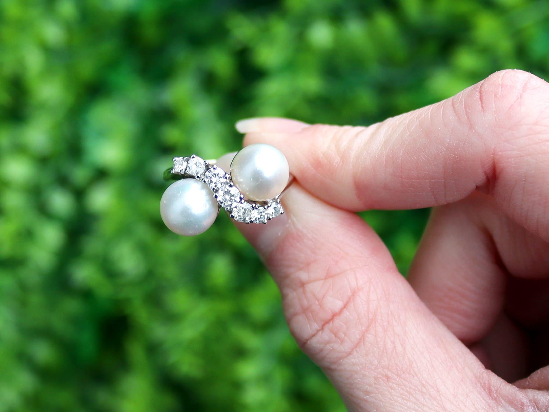 An impressive vintage 1970s cultured pearl and 1.04 Ct diamond, 14k white gold twist ring; part of our diverse pearl jewelry and estate jewelry collections.

This fine and impressive vintage cultured pearl and diamond ring has been crafted in 14k