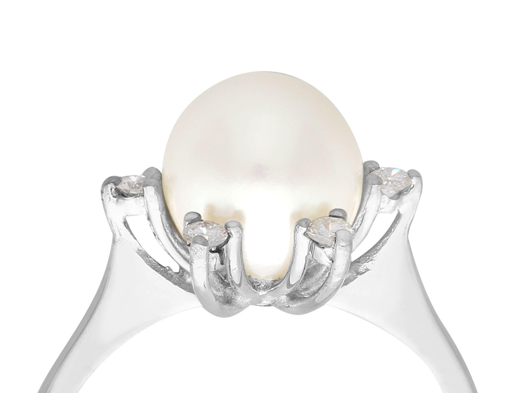 A fine and impressive antique cultured pearl and 0.18 carat diamond, 18k white gold dress ring; part of our antique jewelry and estate jewelry collections

This fine and impressive cultured pearl dress ring has been crafted in 18k white gold.

The