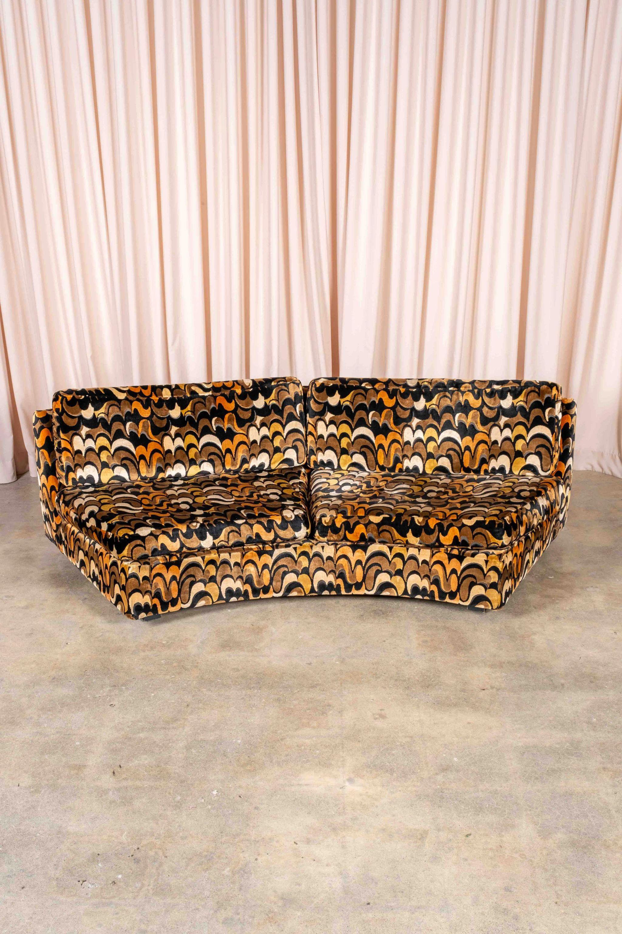 Curved sofas are having a new heyday, so why not capitalize on the trend with something vintage? This dramatic piece by Milo Baughman (1923 – 2003) for Thayer-Coggin brings a graceful swerve to wherever it’s placed. The finishing touch is a vibrant
