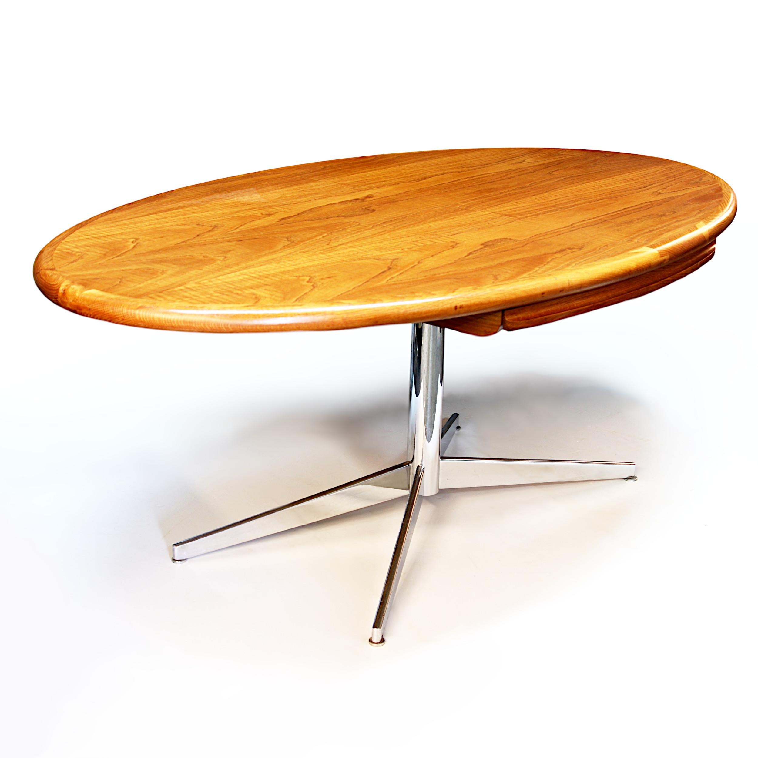 Custom-ordered, executive desk by Florence Knoll. Desk features oak oval top, Classic chrome base, and center drawer. The rare, custom made, oak top features a thick, rounded edge made from solid oak and center drawer with sculpted oak front! A very