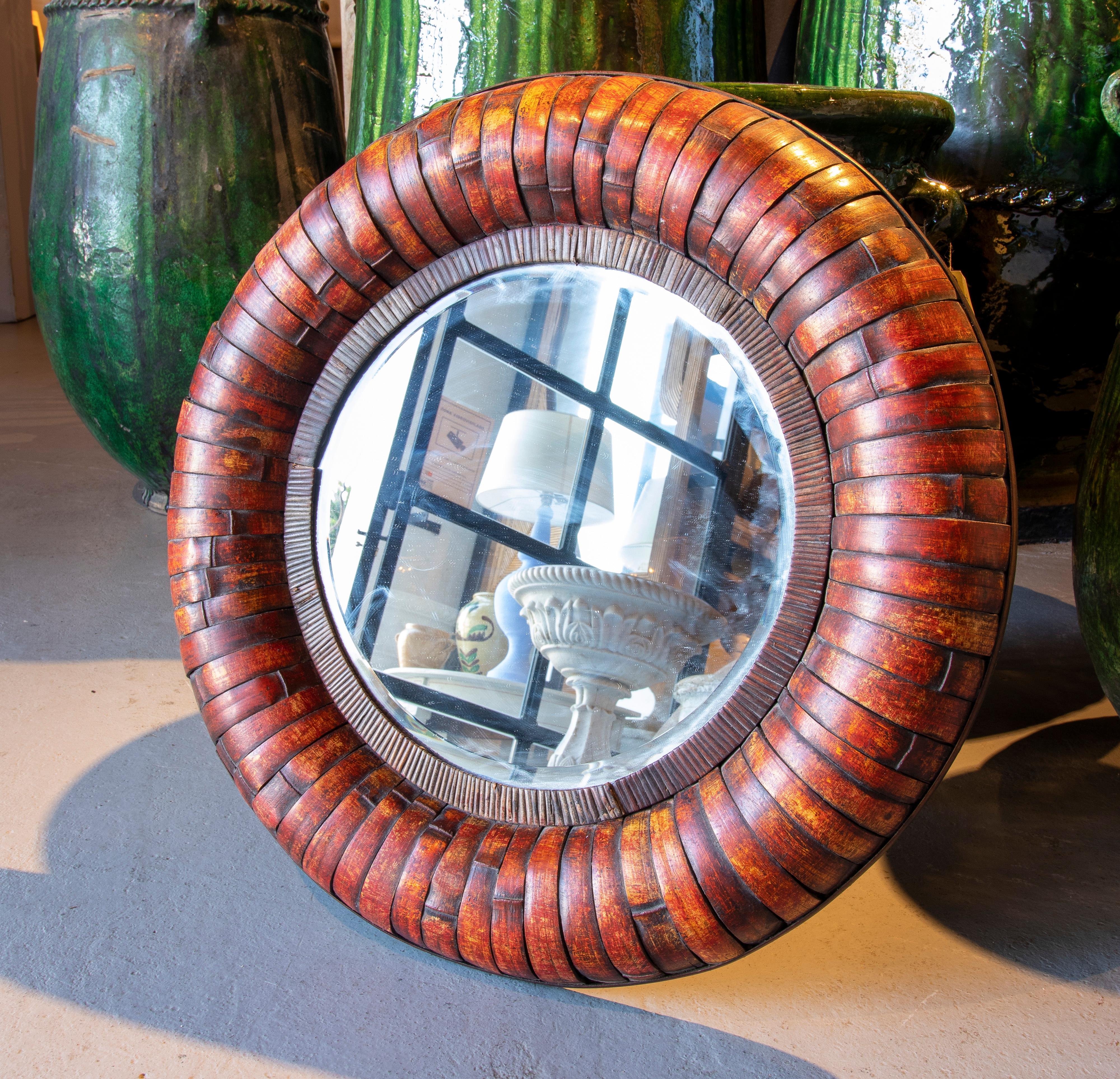 1970s rounded bamboo wall mirror.
