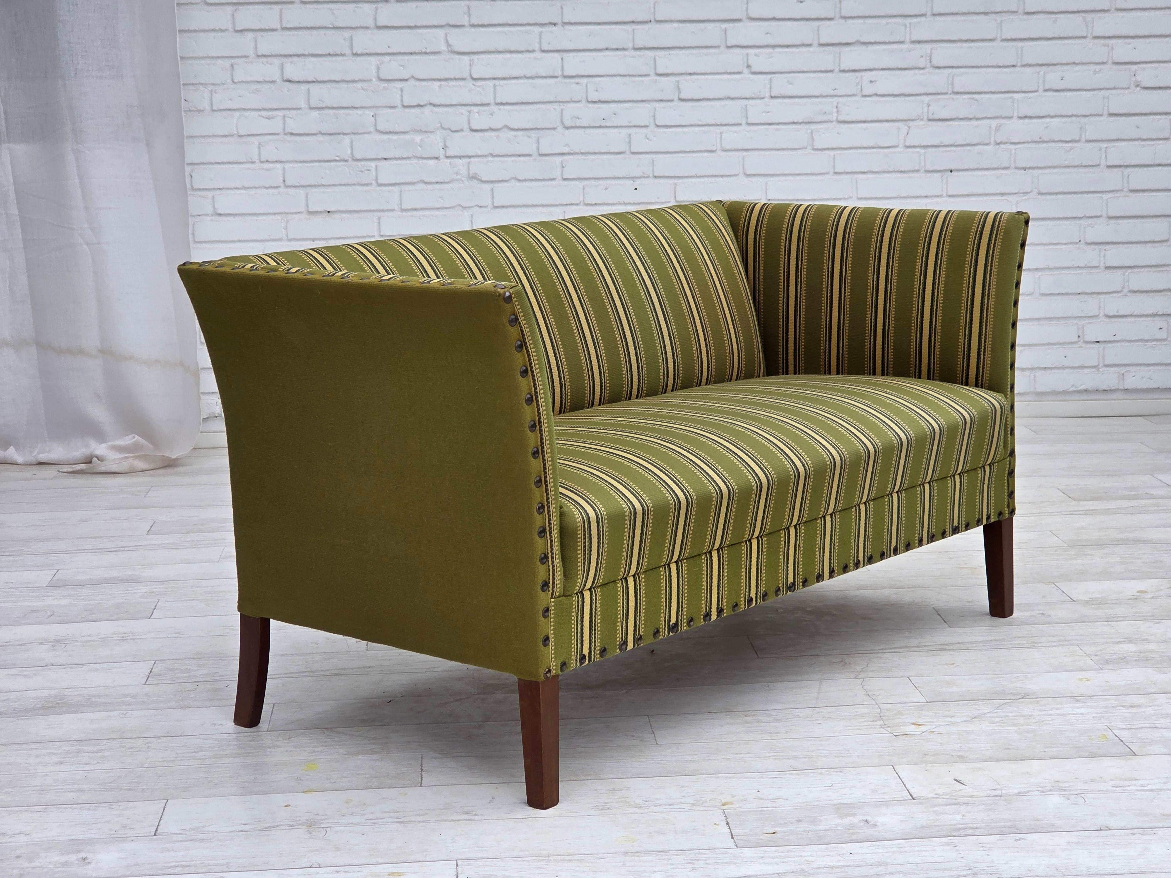 Scandinavian Modern 1970s, Danish 2-seater sofa, original green furniture wool, beech wood. For Sale