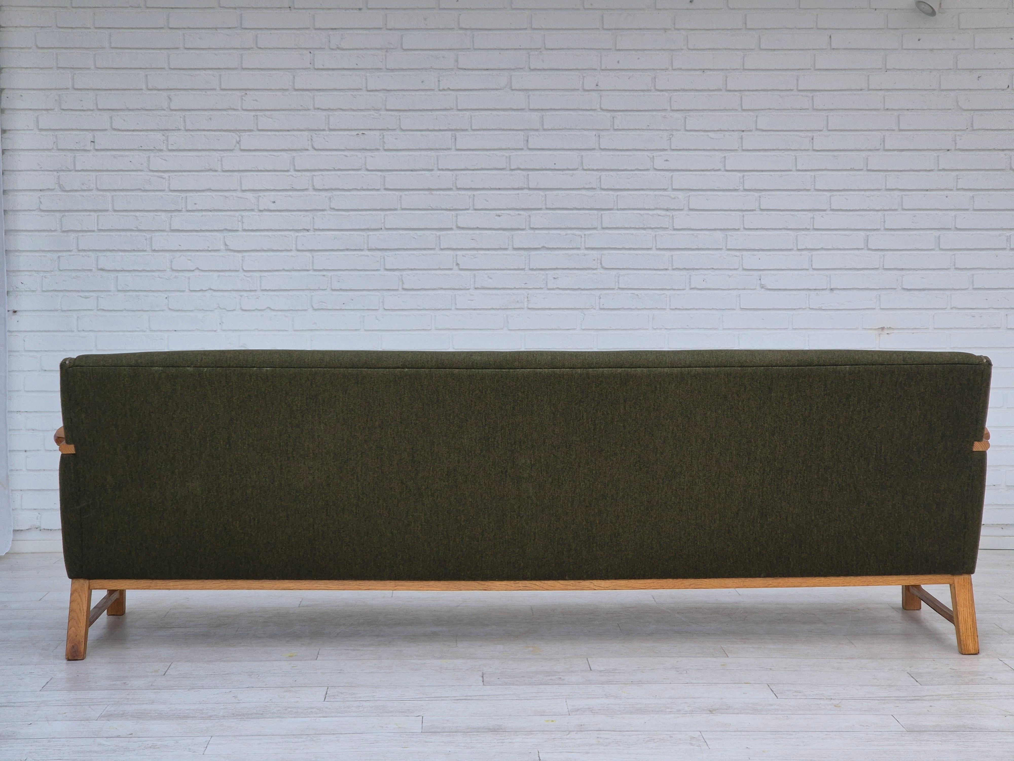 1970s, Danish 4 seater sofa, original very good condition, wool, oak wood. For Sale 1