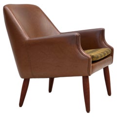 1970s, Danish armchair, artificial leather, teak wood legs.