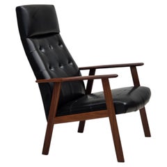 1970s, Danish armchair, black artificial leather, teak wood.