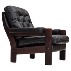 Poltrona anni 
70, Wood Wood, pelle marrone, legno di Oak.