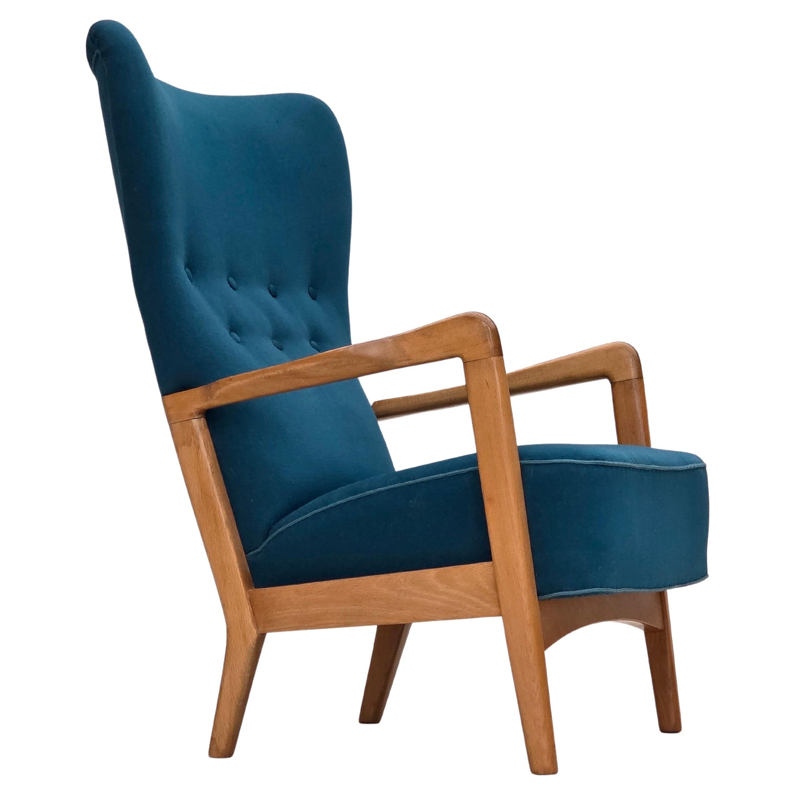 Poltrona danese degli anni '70 di Fritz Hansen, lana per mobili, legno di faggio laccato.