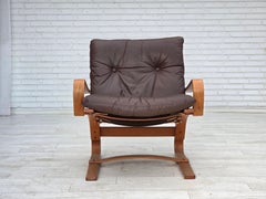 1970, fauteuil danois par Komfort, meuble en cuir, toile, bois courbé.