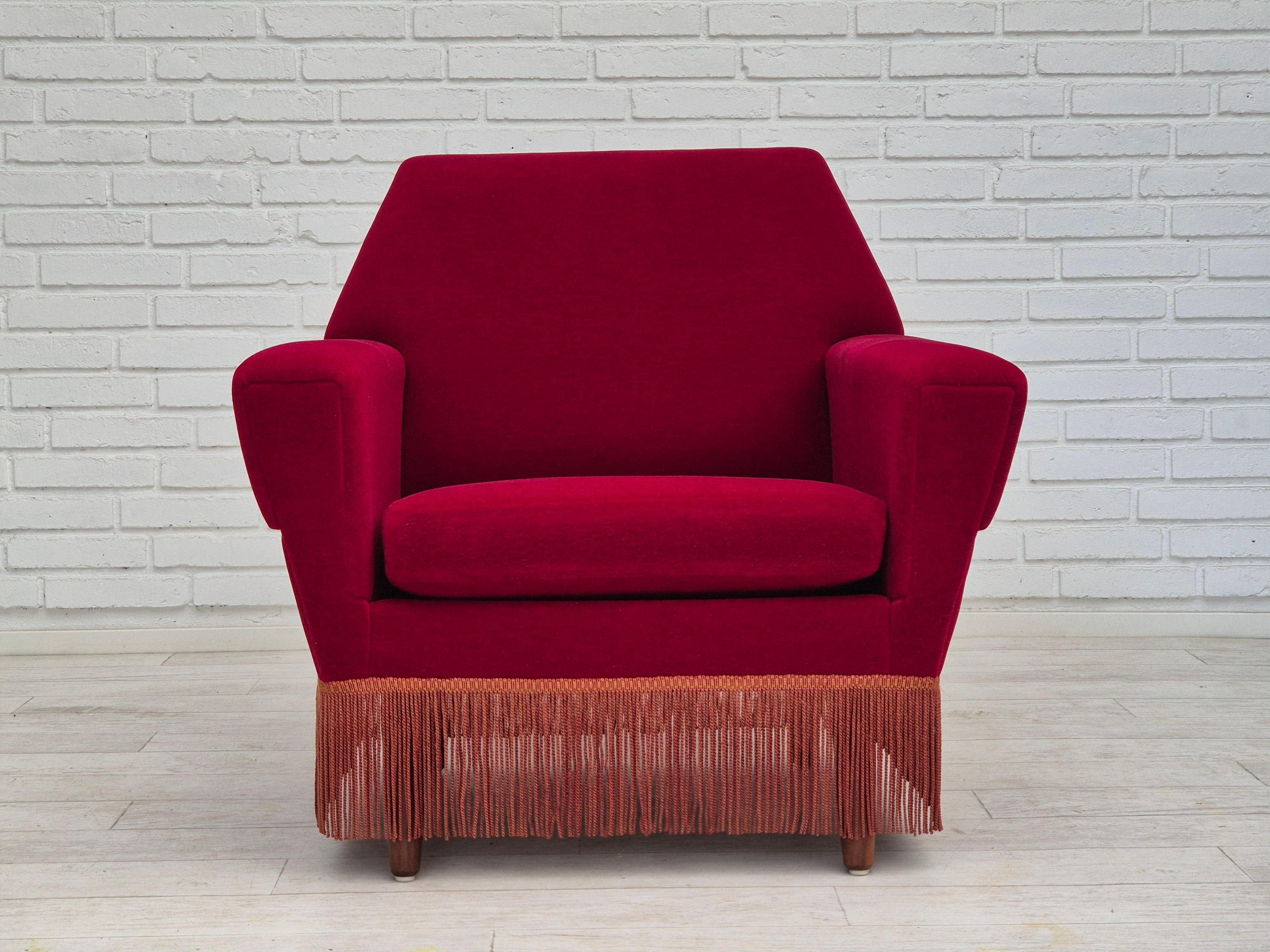 1970s, Danish armchair in original very good condition: no smells, no stains, stable construction, used not too much from 1970s. Removable seat cushion. Original cherry red furniture velour, teak wood legs, springs in the seat cushion. Manufactured