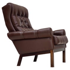 Années 1970, fauteuil danois, cuir d'ameublement marron d'origine.