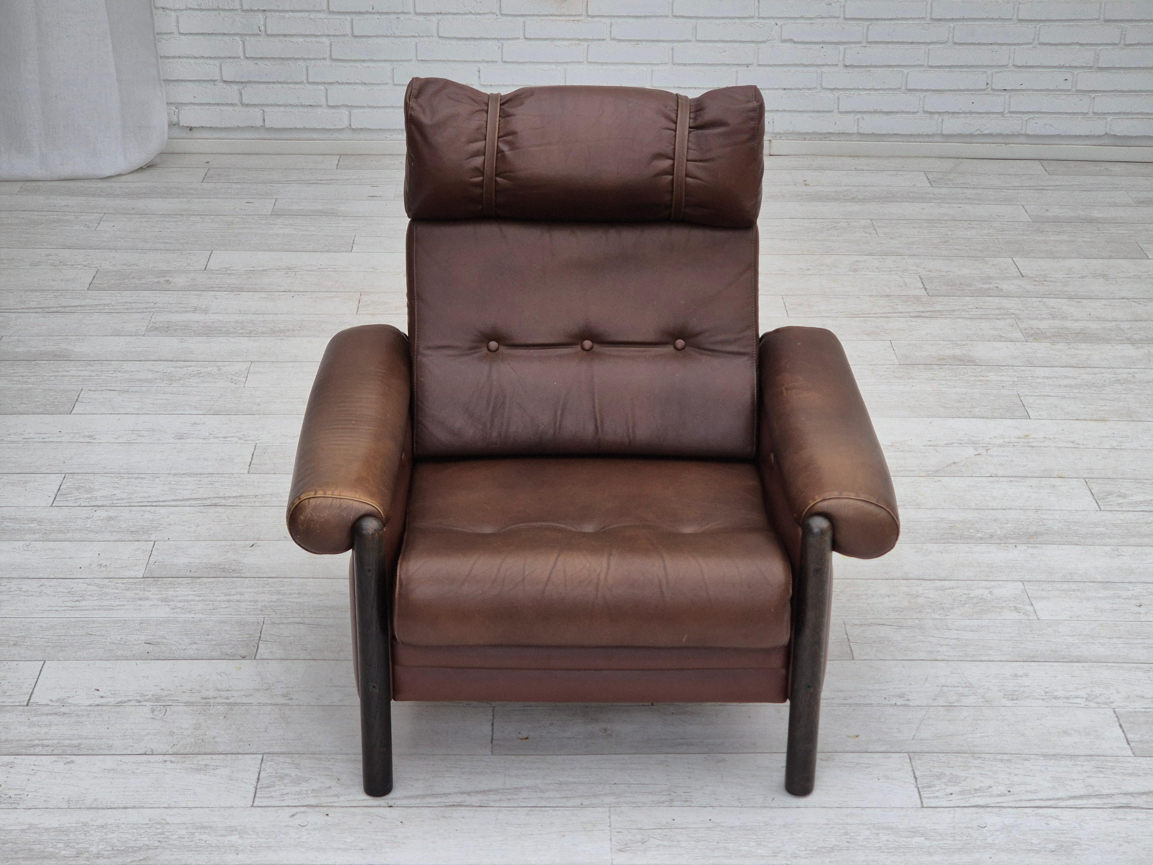 Scandinavian Modern 1970s, Danish armchair, original condition, furniture leather, dark oak wood. For Sale