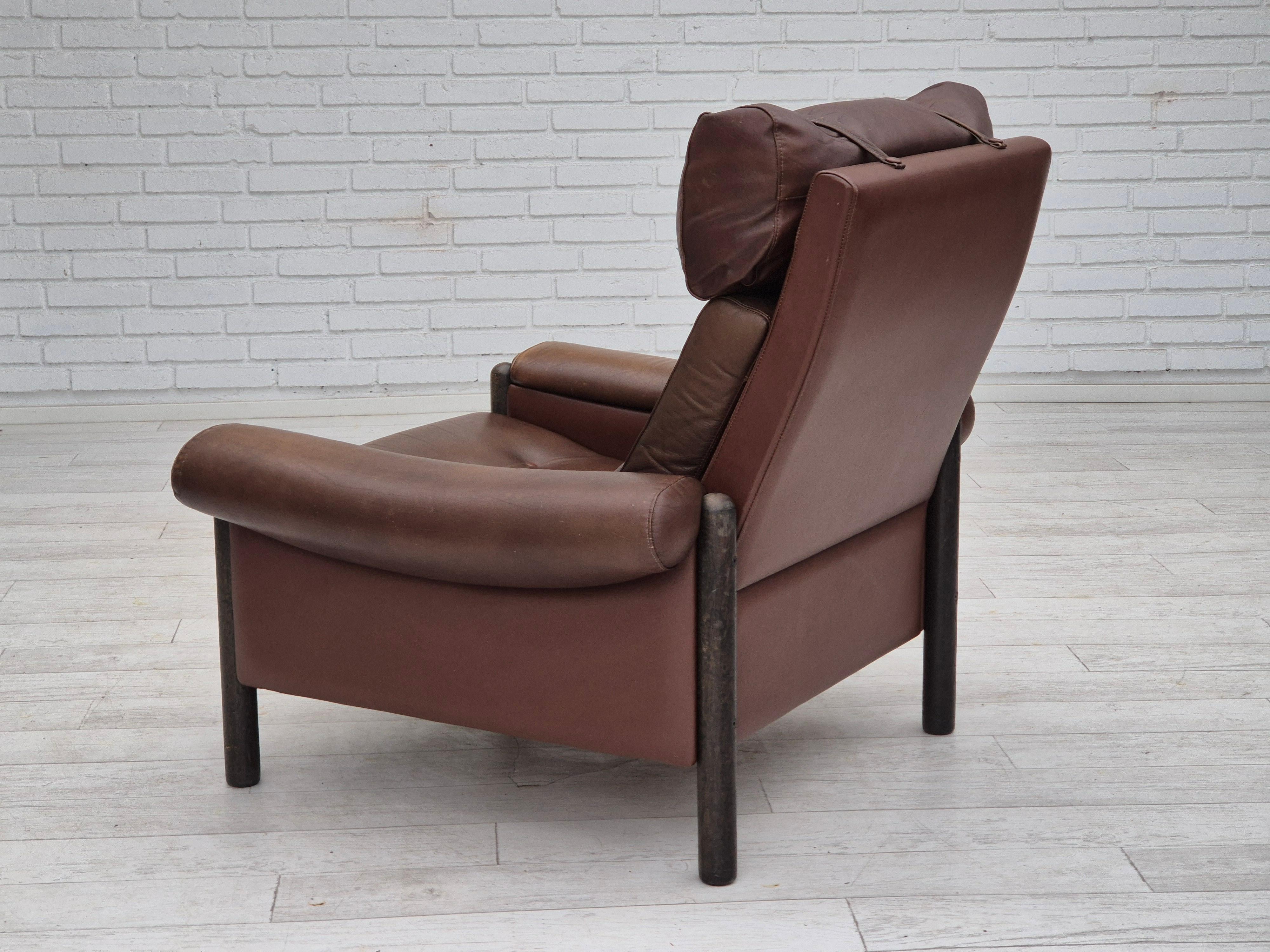 1970s, Danish armchair, original condition, furniture leather, dark oak wood. For Sale 1