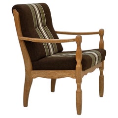 Anni '70, poltrona danese, tessuto originale in lana a righe, legno di rovere intagliato.