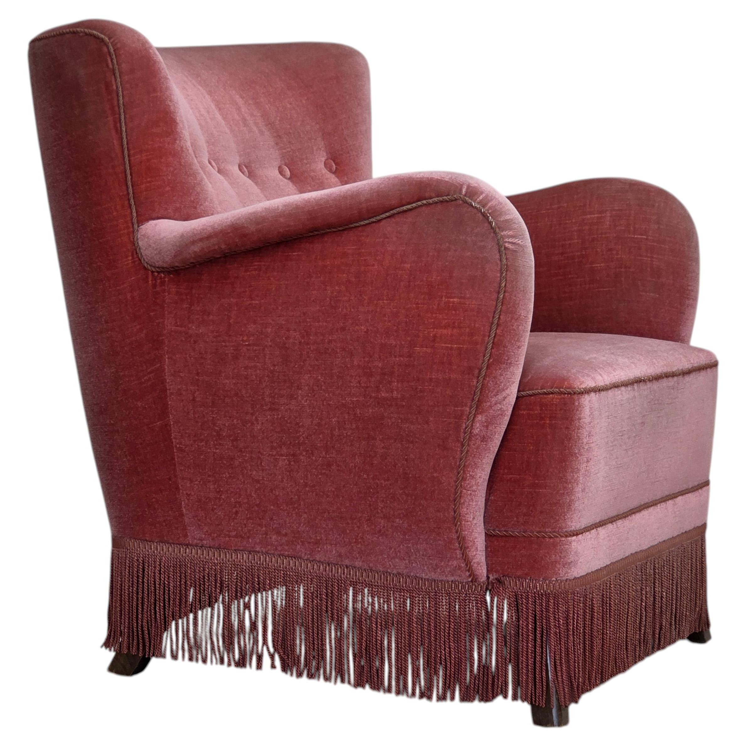 1970s, Danish armchair, salmon pink furniture velour, oak wood legs.