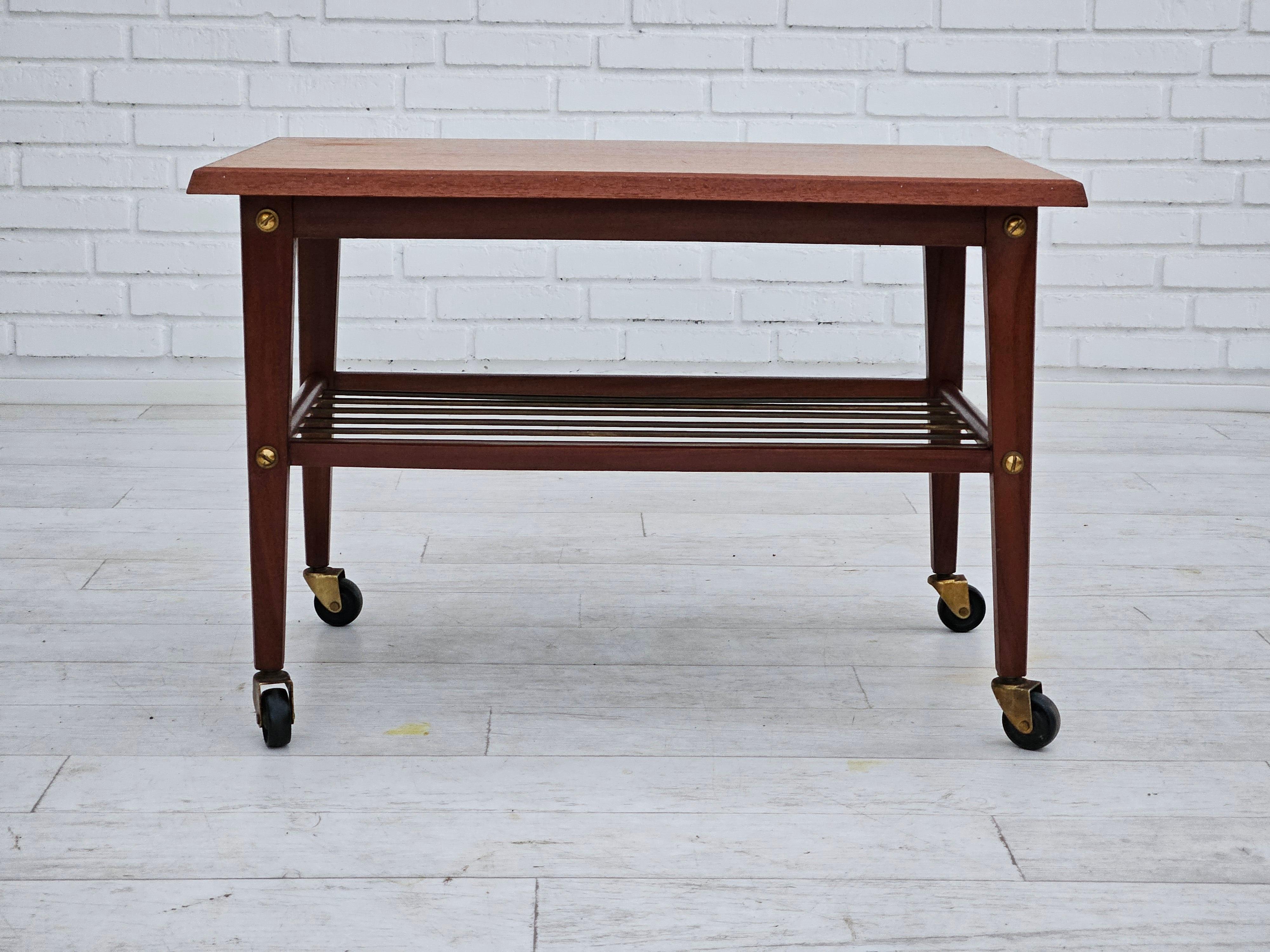 Scandinavian Modern 1970s, Danish coffee table, wheels, teak wood. For Sale