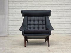 Años 70, diseño danés de Illum Wikkelsø, sillón retapizado, cuero.