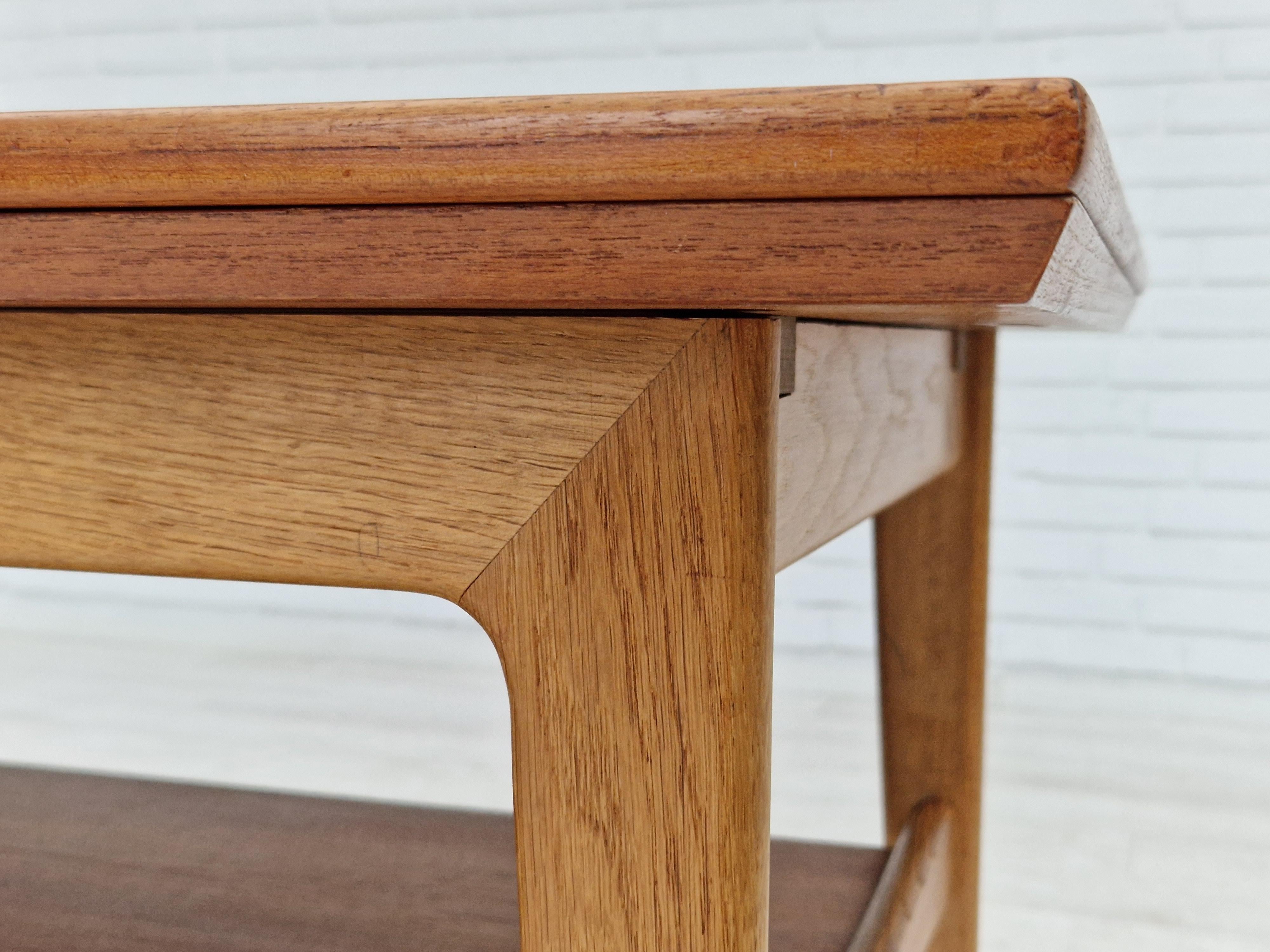 Oak 1970s, Danish design, folding sofa table, teak wood and oak wood. For Sale