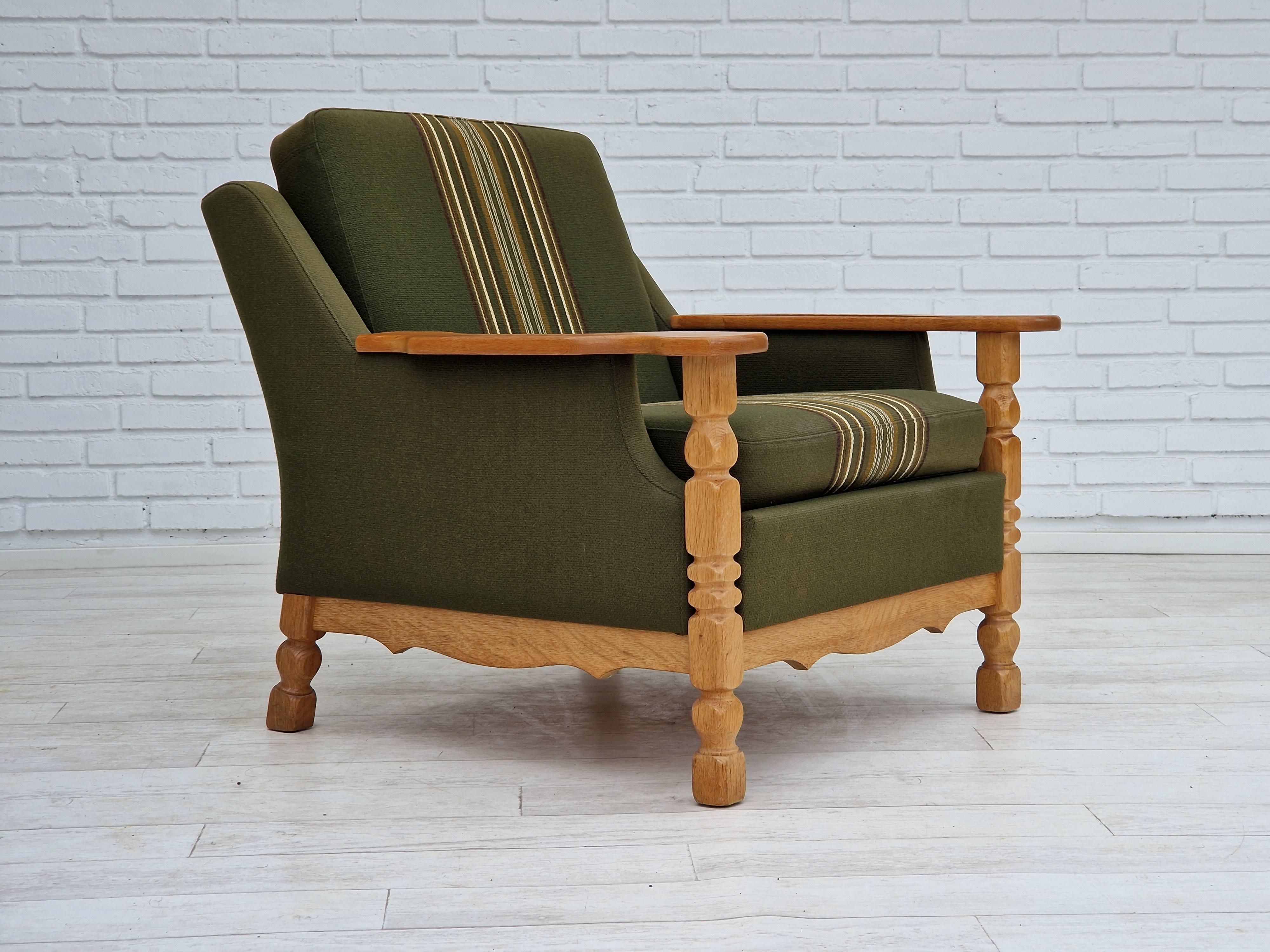 Scandinavian Modern 1970s, Danish design, lounge chair in green furniture wool, oak wood. For Sale
