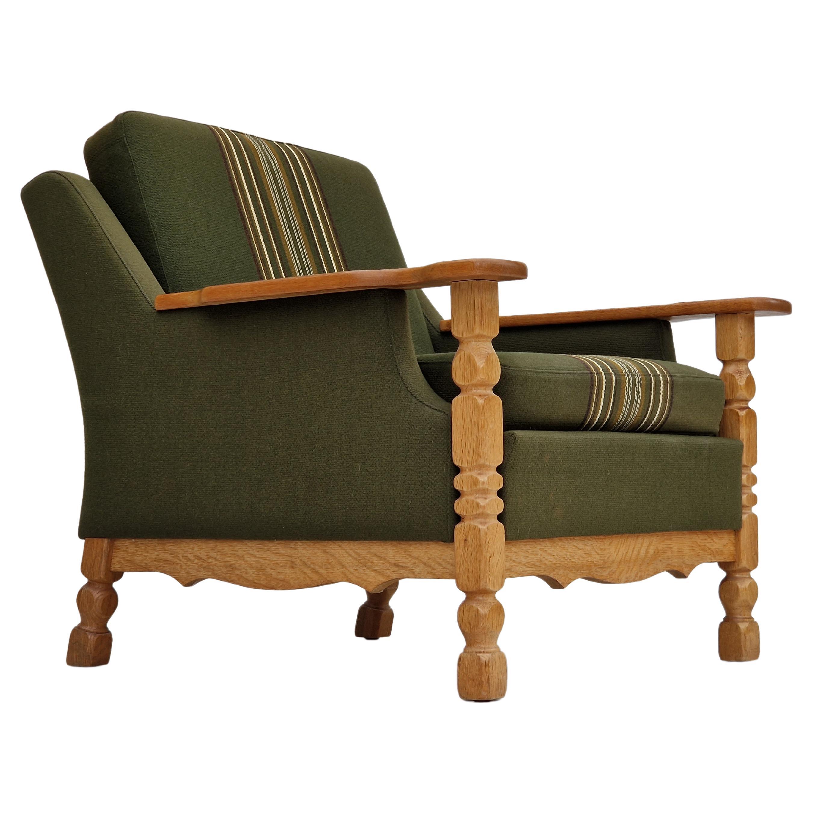 1970s, Danish design, lounge chair in green furniture wool, oak wood.