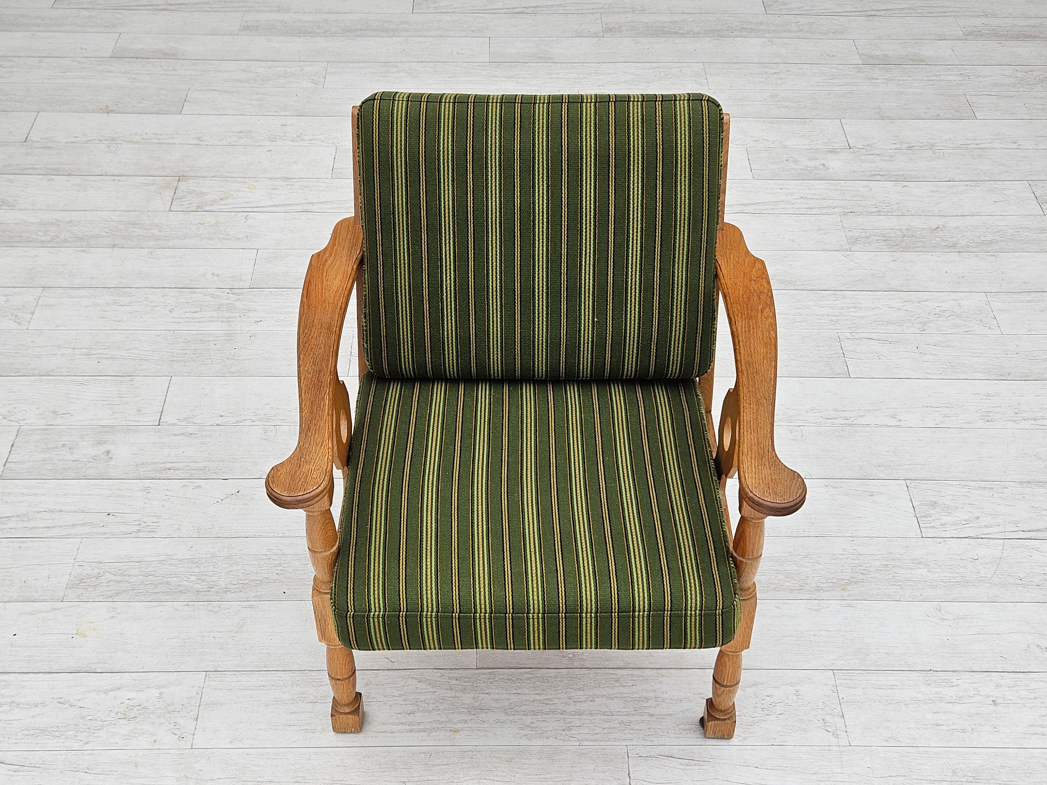 Lacquered 1970s, Danish design, oak wood armchair in furniture wool, original condition. For Sale