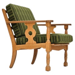 Used 1970s, Danish design, oak wood armchair in furniture wool, original condition.