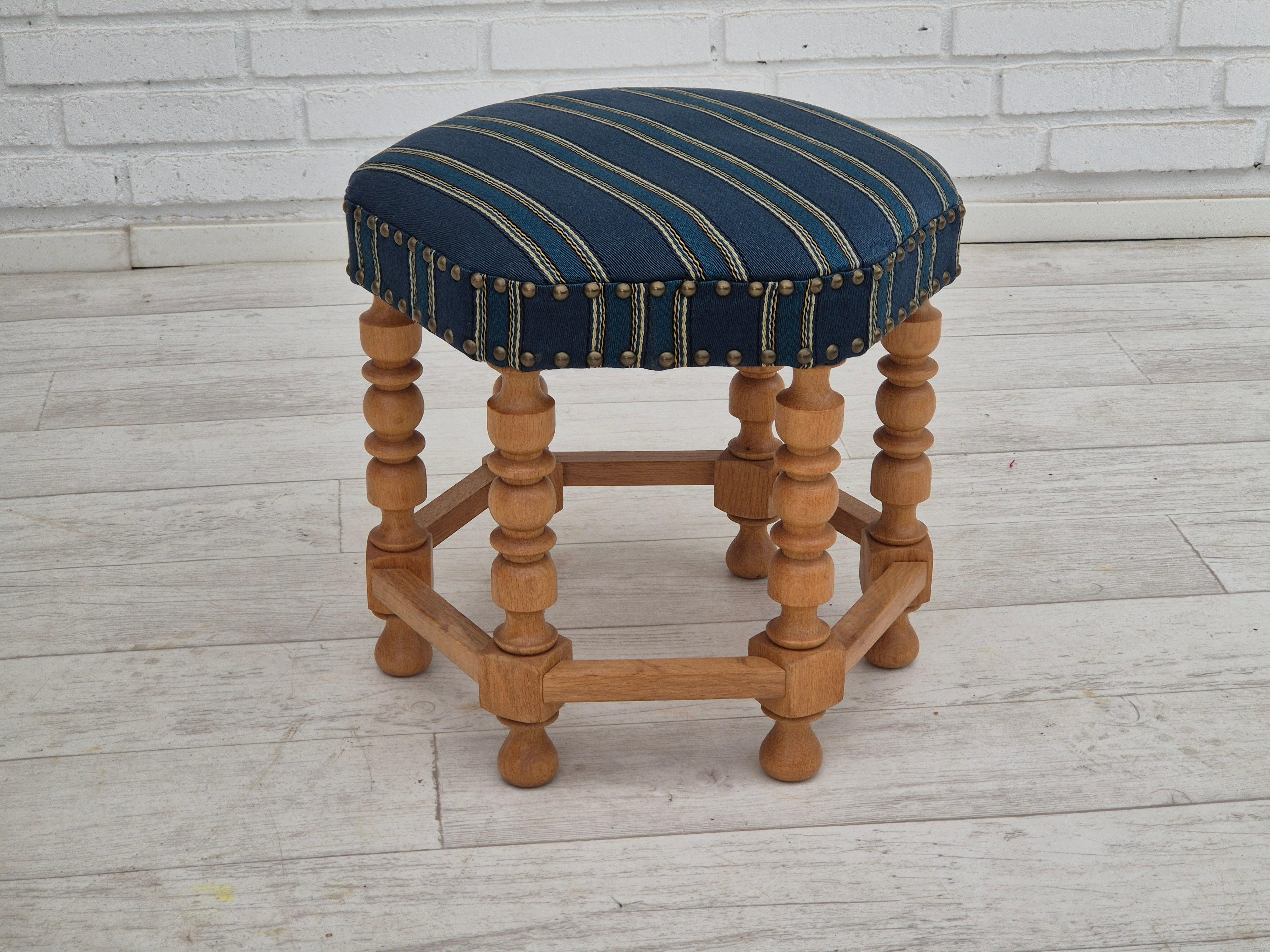 Scandinavian Modern 1970s, Danish design, oak wood rocking chair with footstool, furniture wool. For Sale