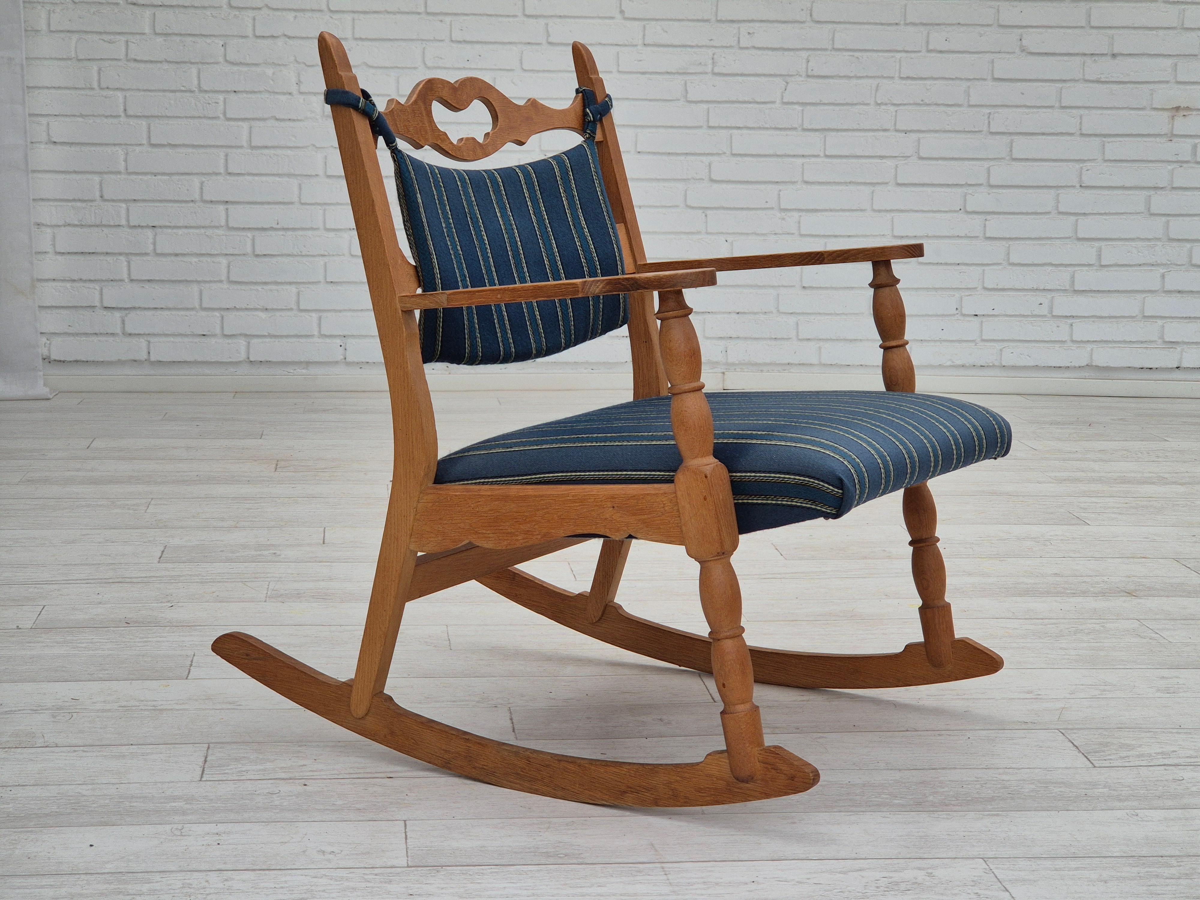 Mid-20th Century 1970s, Danish design, oak wood rocking chair with footstool, furniture wool. For Sale