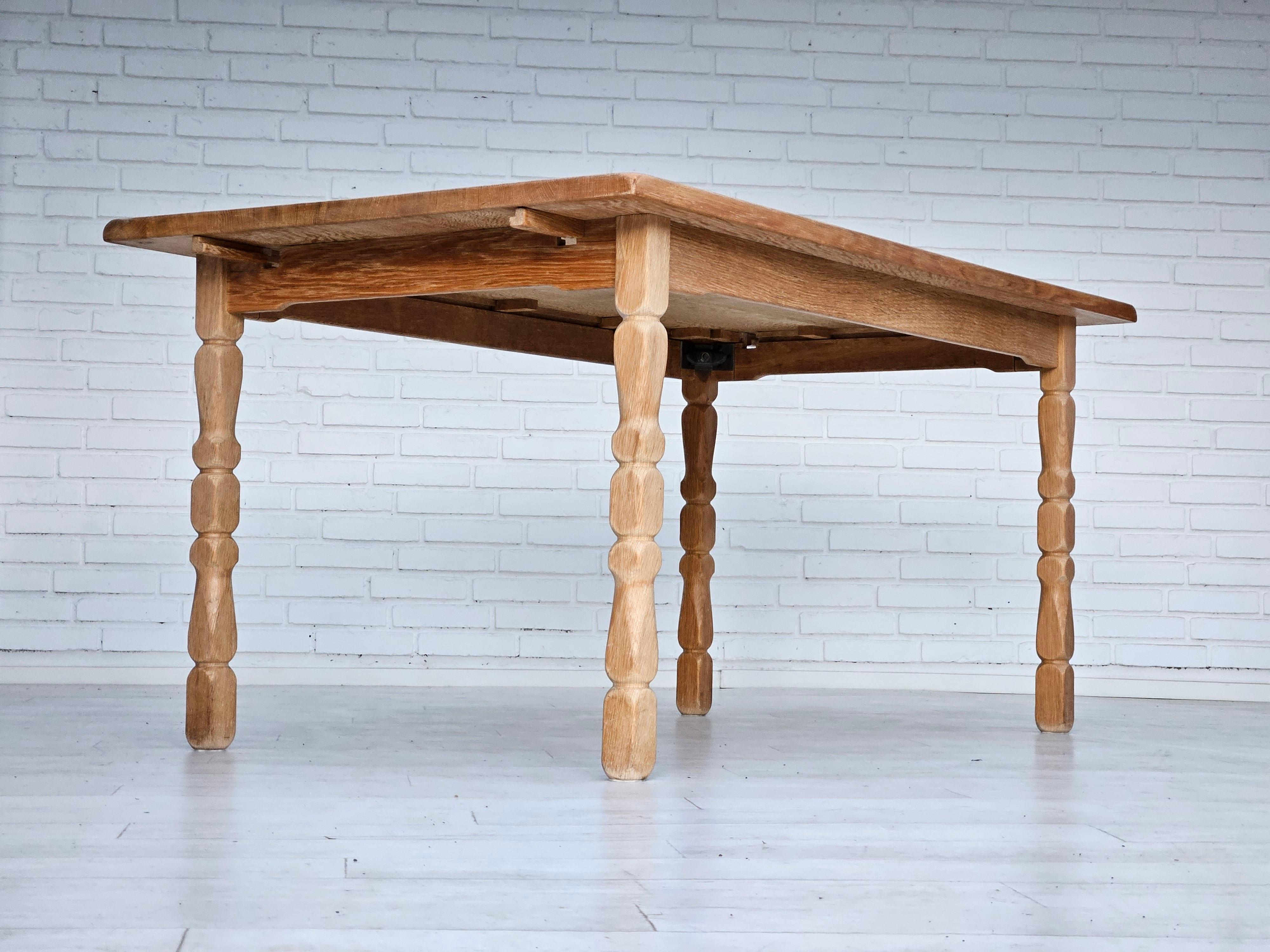 Polished 1970s, Danish dining table, oak wood, original condition.