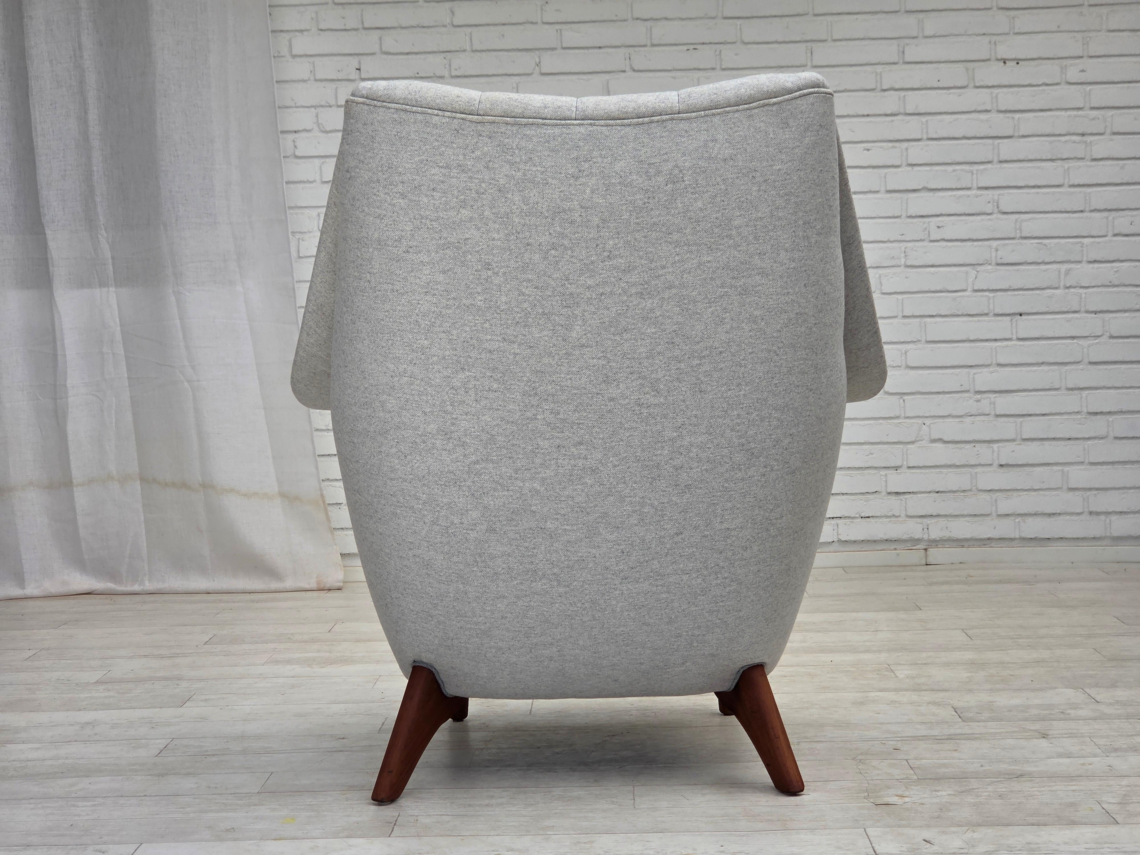 1970s, Danish high-backed armchair with stool, wool, teak wood. Danés en venta