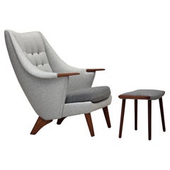 1970s, Danish high-backed armchair with stool, wool, teak wood.