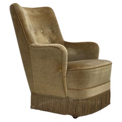 1970, fauteuil danois à dossier haut, velours d'ameublement vert clair.