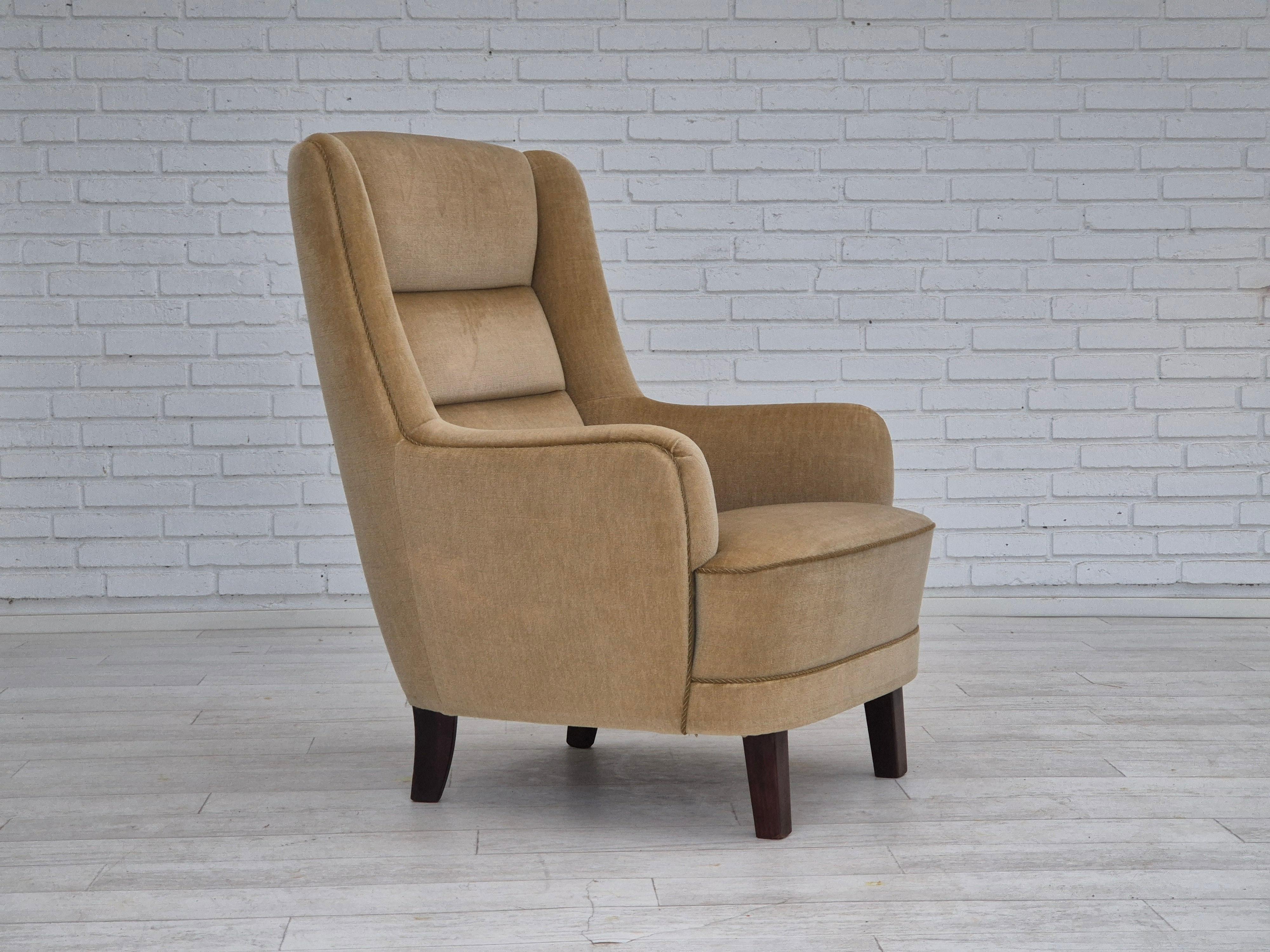 1970s, Danish high back armchair. Original very good condition: no smells, no stains, and stable construction. Original light green furniture velour, beech wood legs, springs in the seat. Classic Scandinavian Design from 70s. Manufactured by Danish