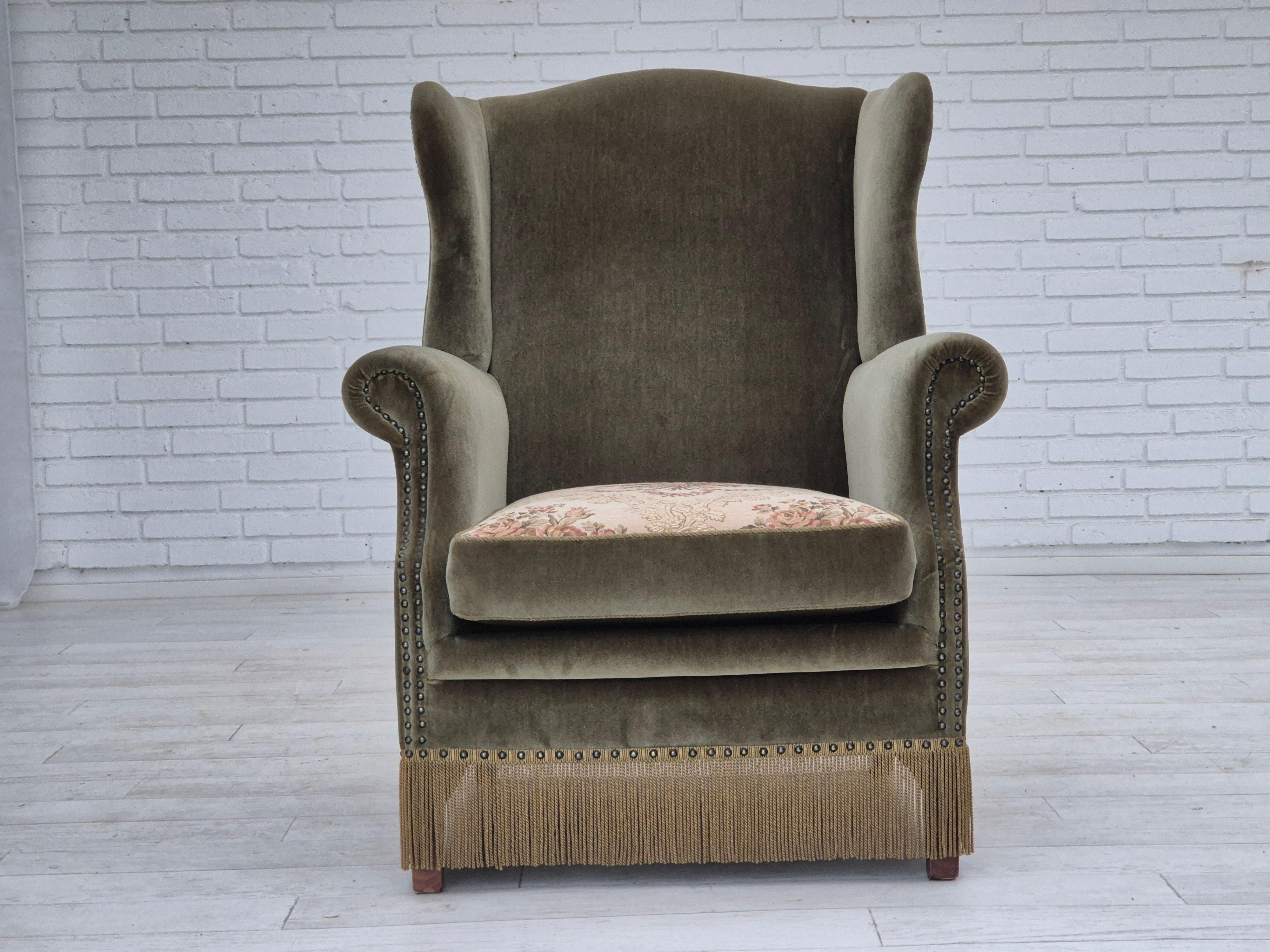 1970s, Danish high back armchair chair. Original very good condition: no smells, no stains and stable construction. Original green furniture velour, double sided seat cushion. Springs in the seat cushion. Beech wood legs. Manufactured by Danish