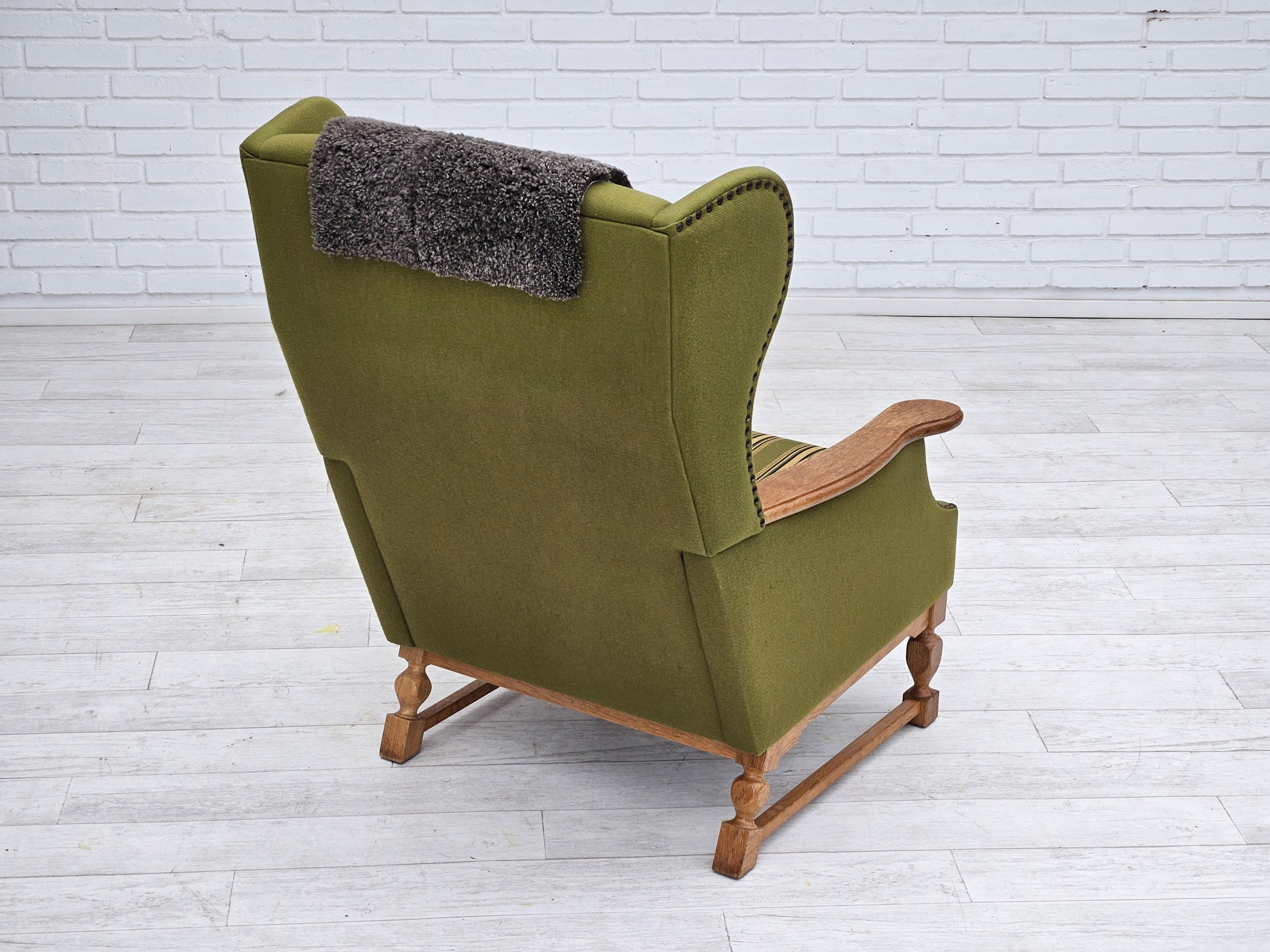 Late 20th Century 1970s, Danish highback armchair, wool, oak, original very good condition. For Sale