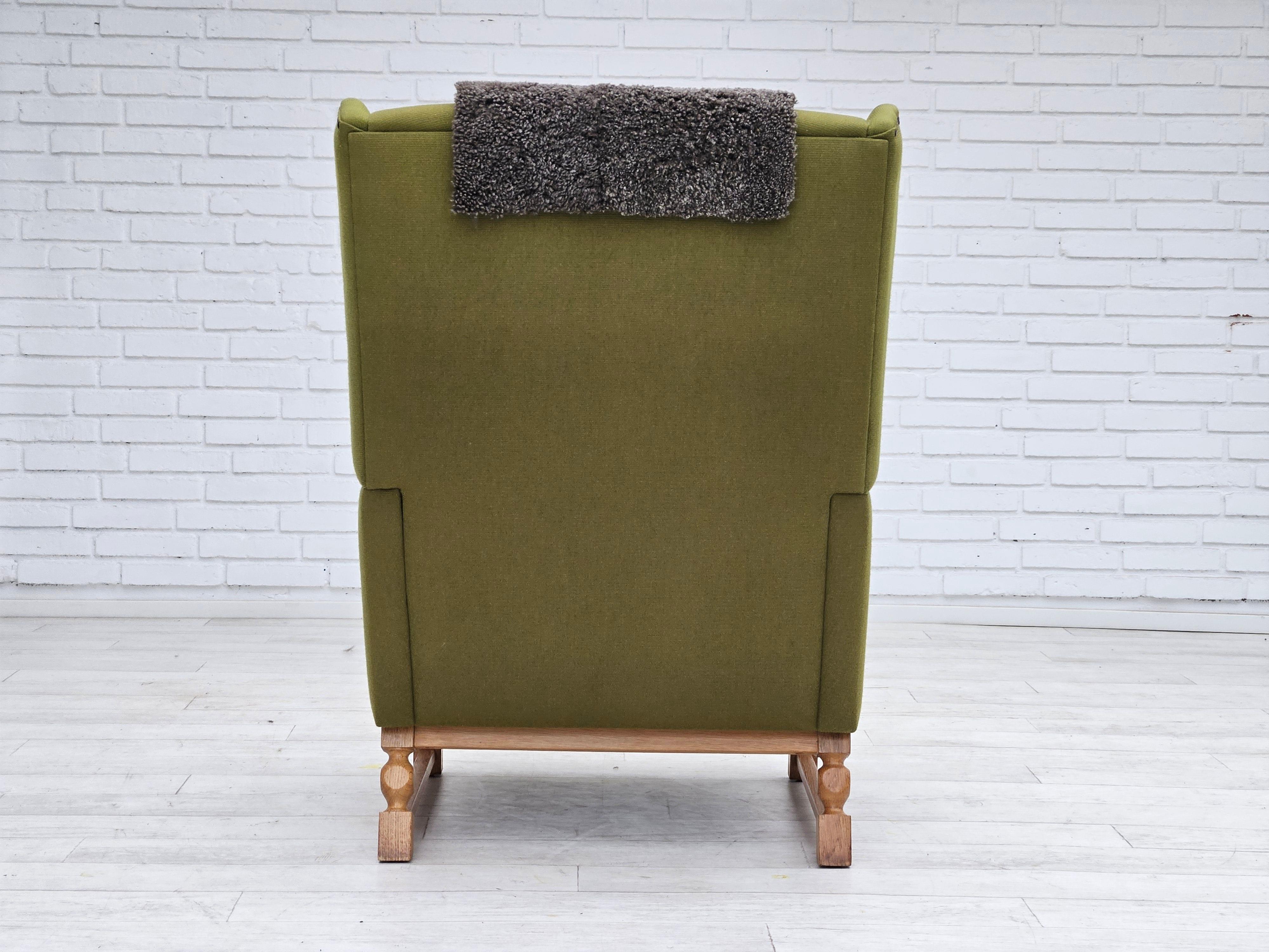 Sheepskin 1970s, Danish highback armchair, wool, oak, original very good condition. For Sale