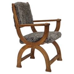 Vintage 1970s, Danish lounge chair, genuine sheepskin "Wellington", oak wood.