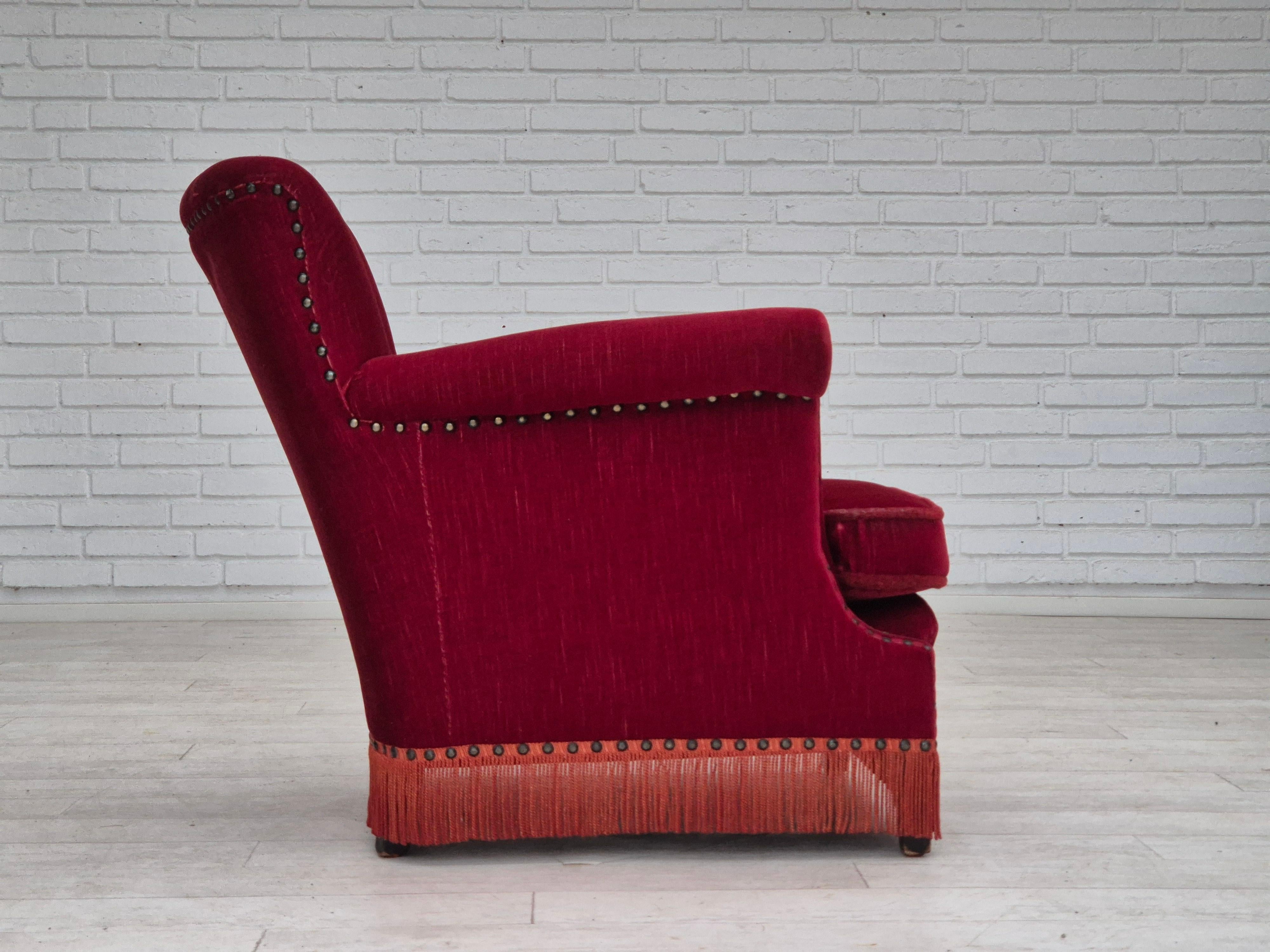 Scandinavian Modern 1970s, Danish lounge chair, original condition, cherry-red velour fabric. For Sale