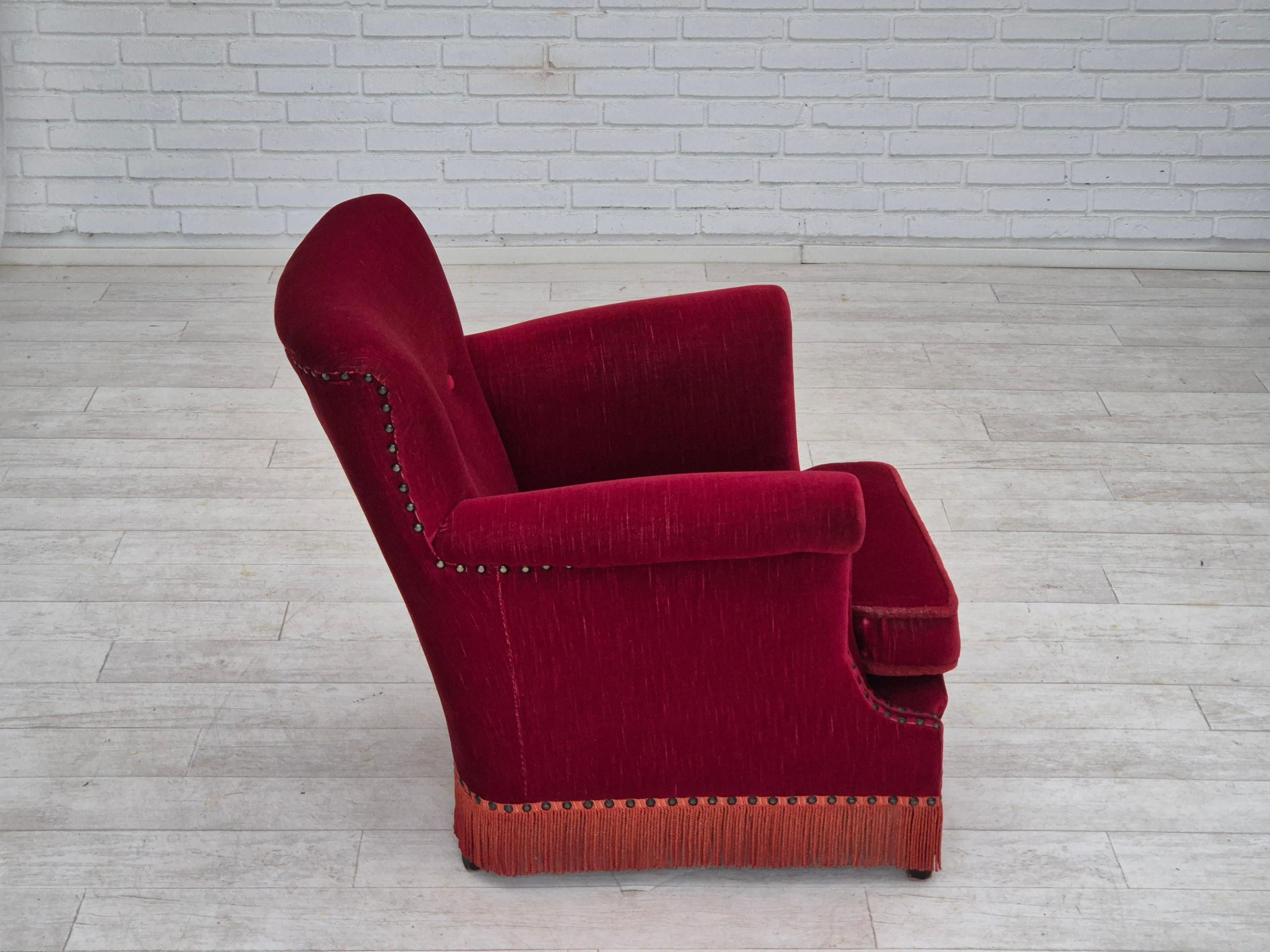 1970s, Danish lounge chair, original condition, cherry-red velour fabric. For Sale 1