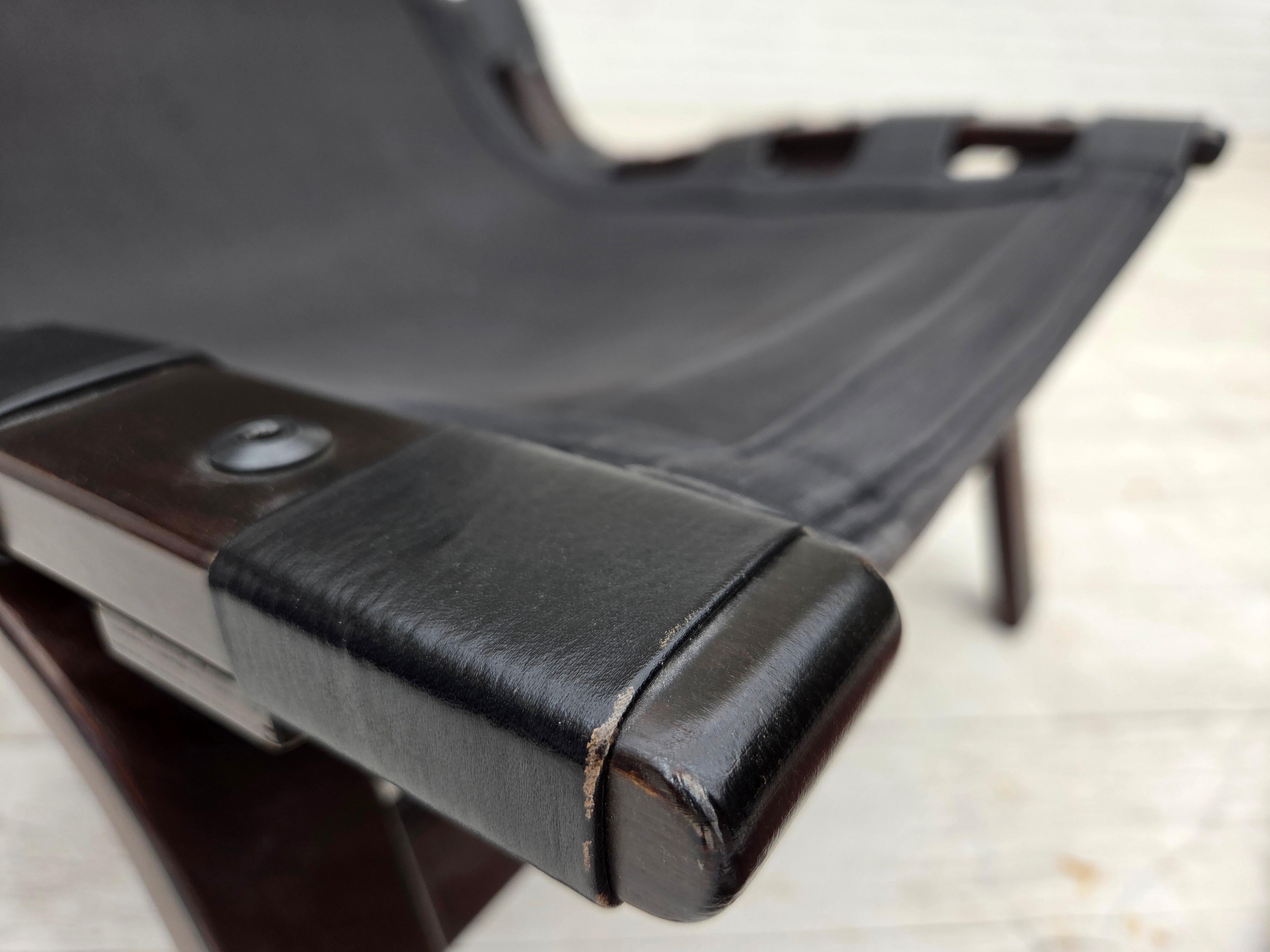 Leather 1970s, Danish loungechair by Farstrup, furniture leather, canvas, bent wood. For Sale