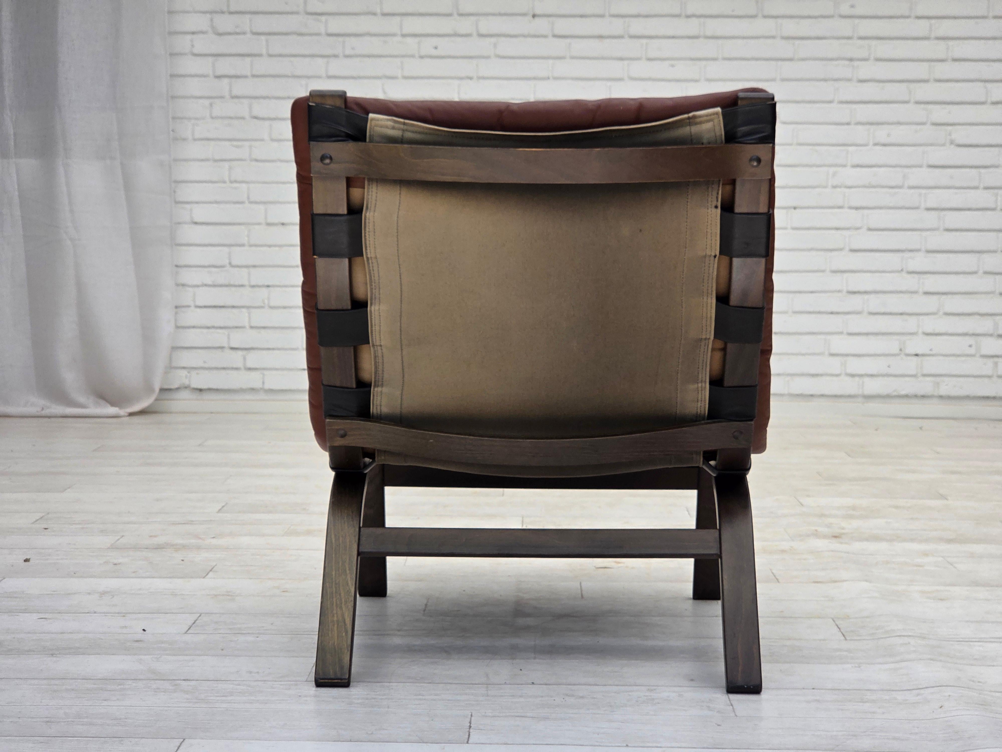 1970s, Danish loungechair by Farstrup, furniture leather, canvas, bent wood. For Sale 1