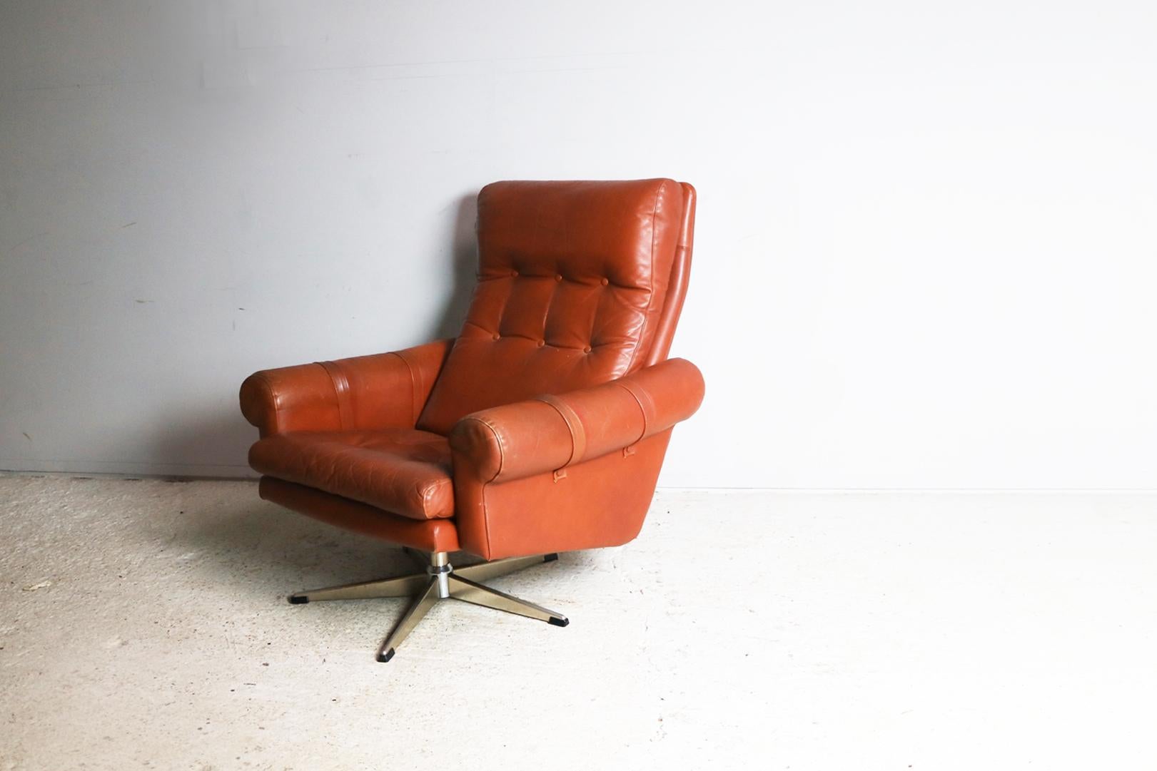 Plated 1970s Danish Midcentury Leather Swivel Armchair For Sale
